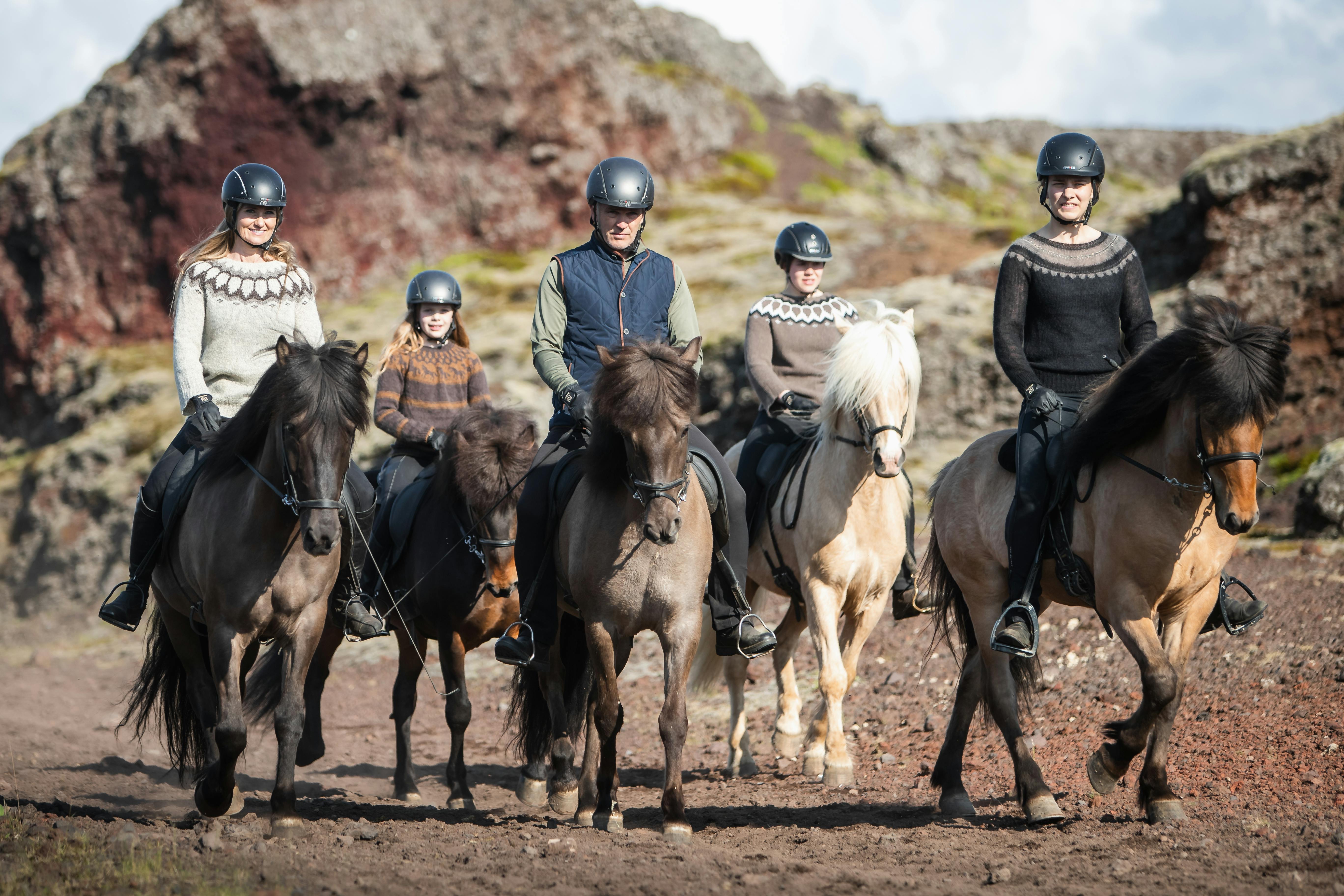 A family of five enjoy a ride in the rauðhólar area close to Reykjavík, Iceland.