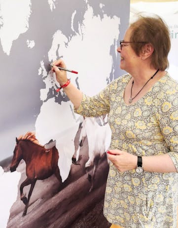 Gundula Sharman, President of FEIF, pinpoints her farm on the Horses of Iceland world map.