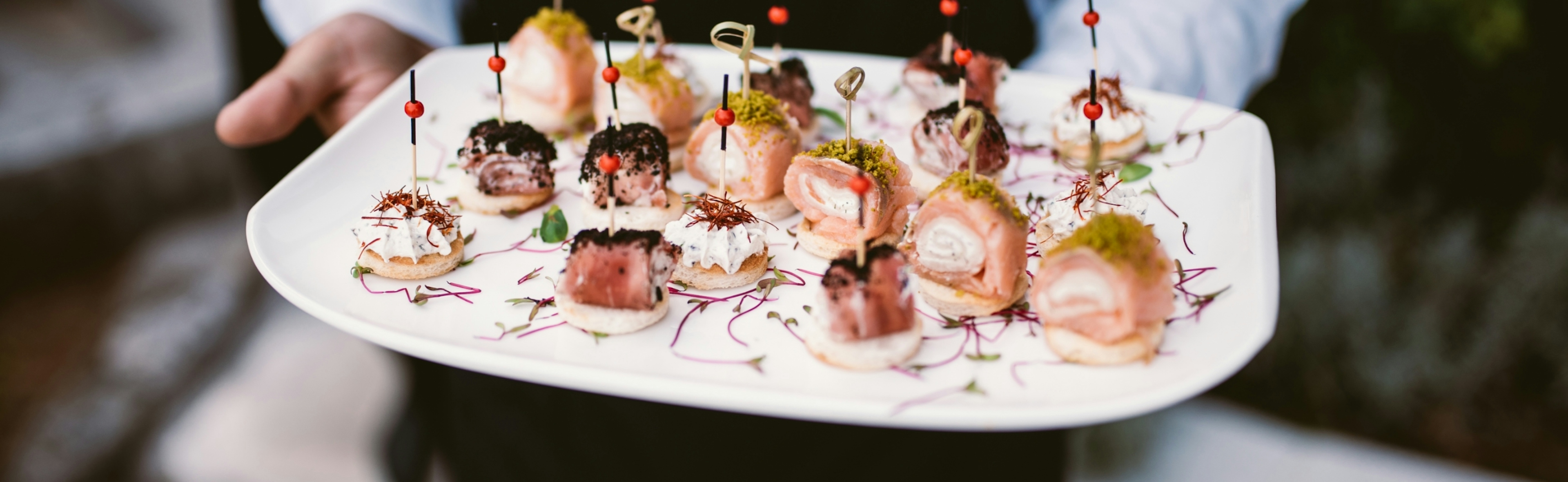 A concierge with a plate of food