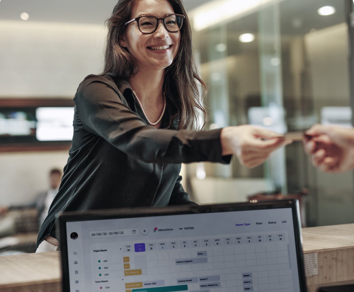 Hotel guest checking in via Cloud PMS for hotels