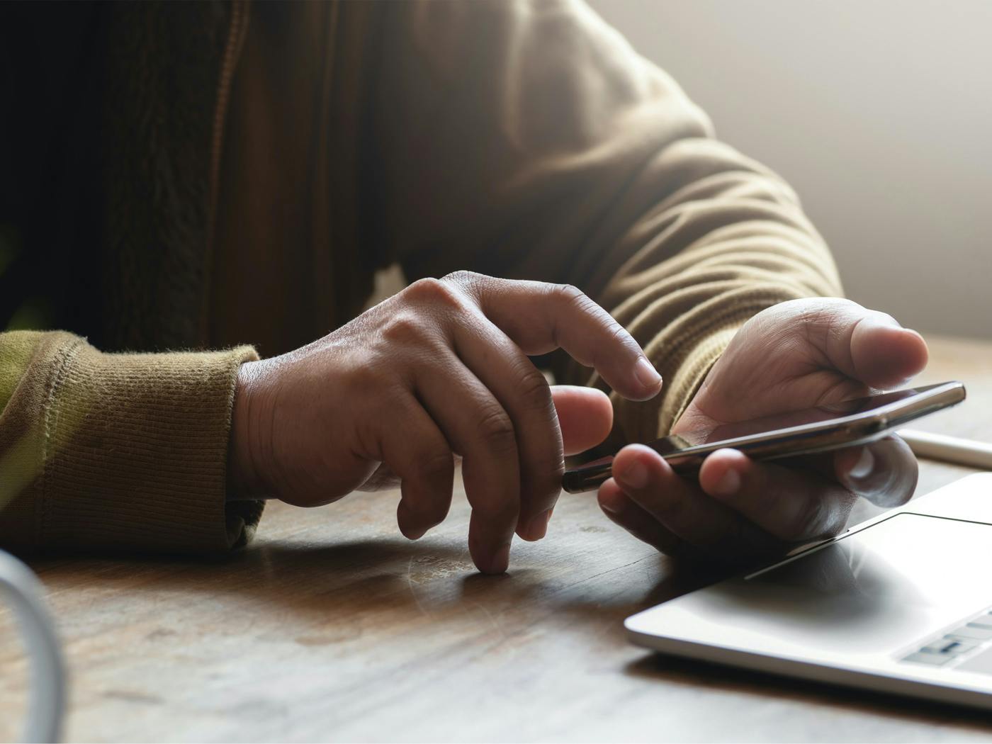 Person using smartphone.