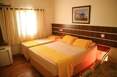 Luxo - Conforto e praticidade para uma estadia tranquila no centro de Patos de Minas.