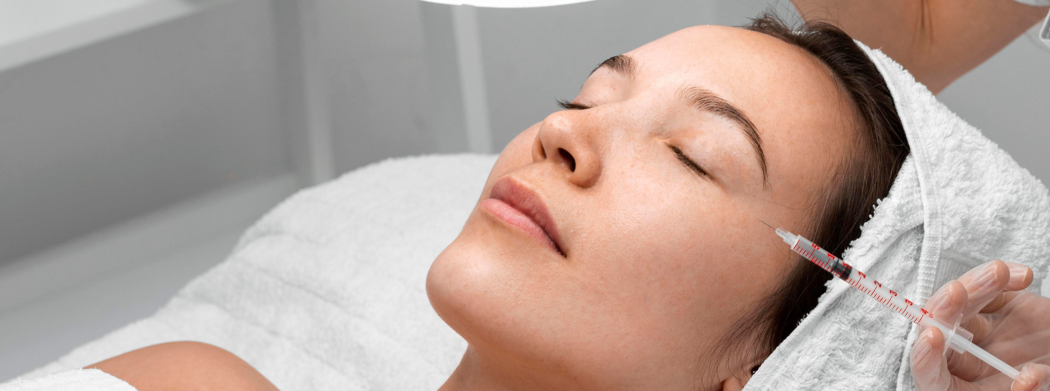 woman having full face anti wrinkle treatment