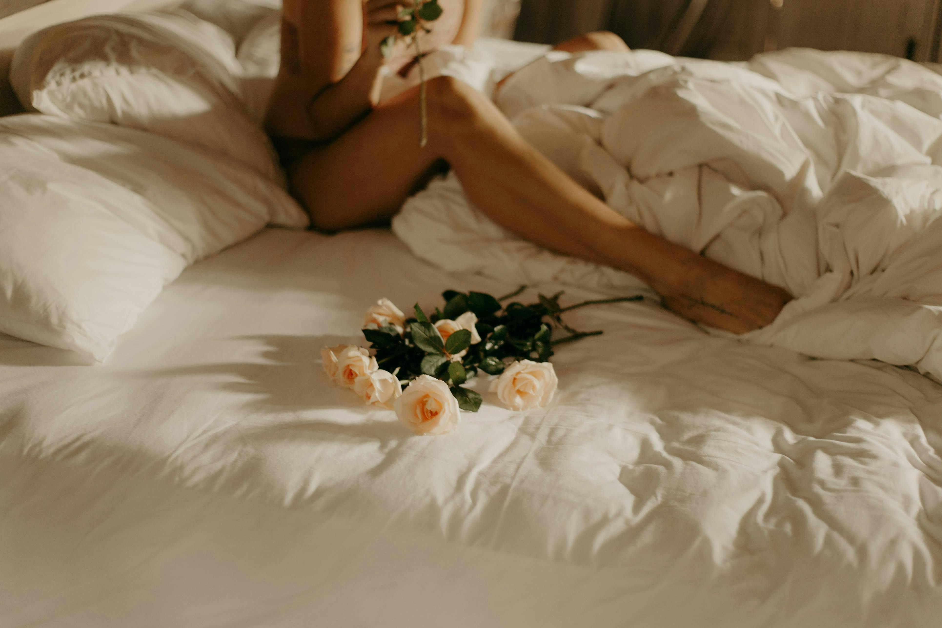 Woman in bed intimate health