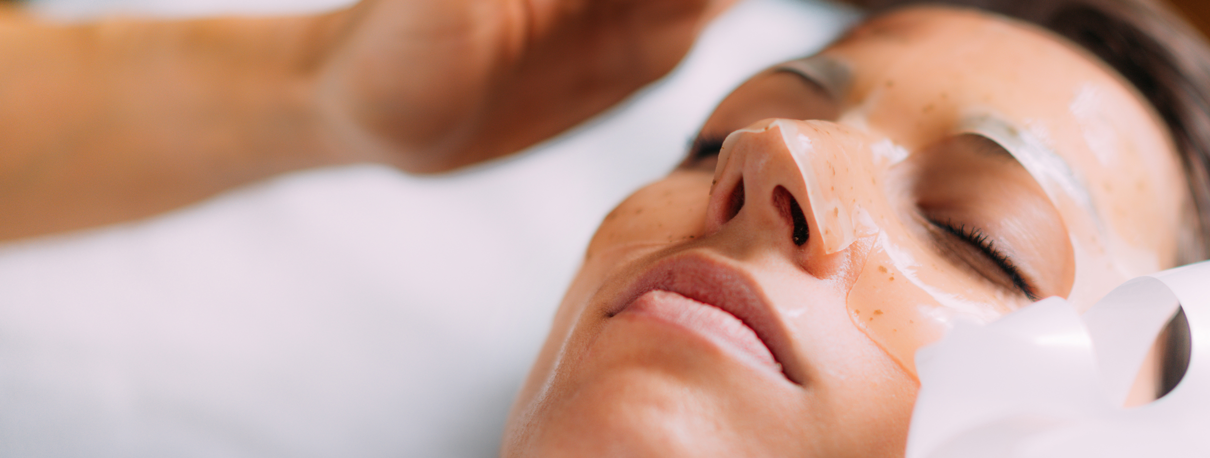 woman having facial treatment