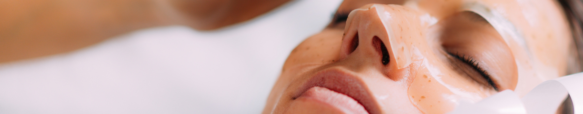 woman having facial treatment
