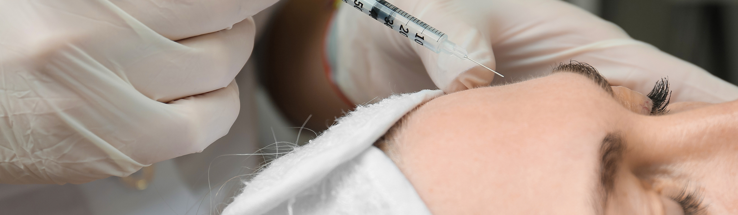 woman getting forehead lines treatment