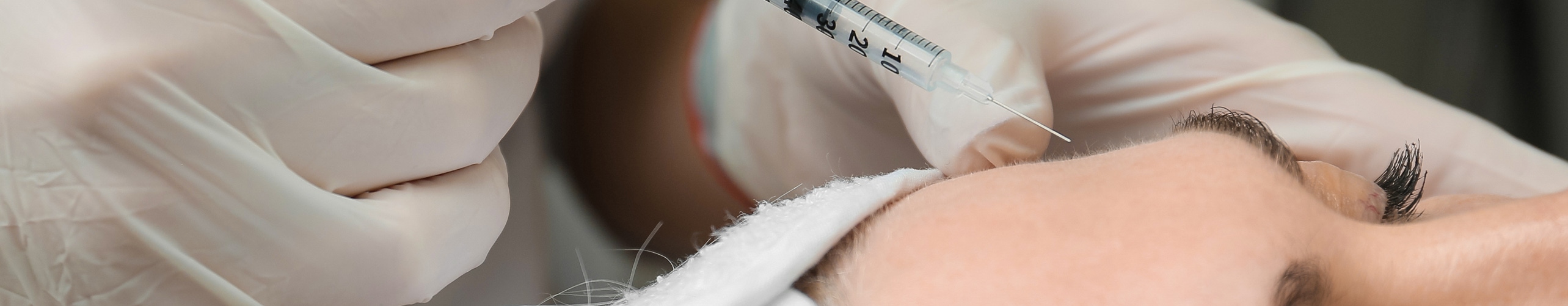 woman getting forehead lines treatment