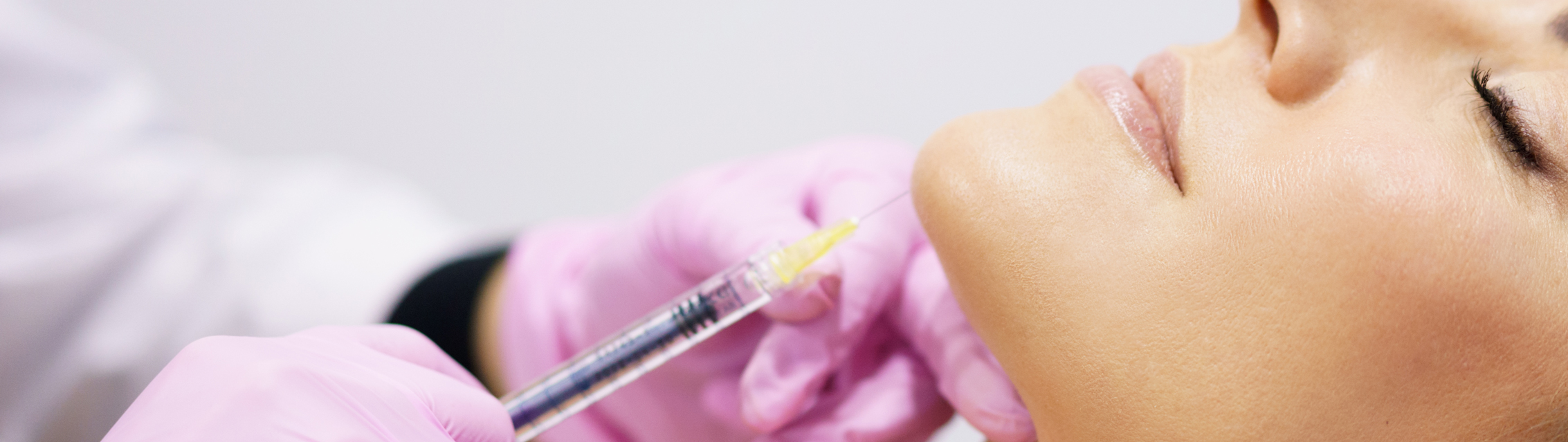 woman having chin enhancement treatment