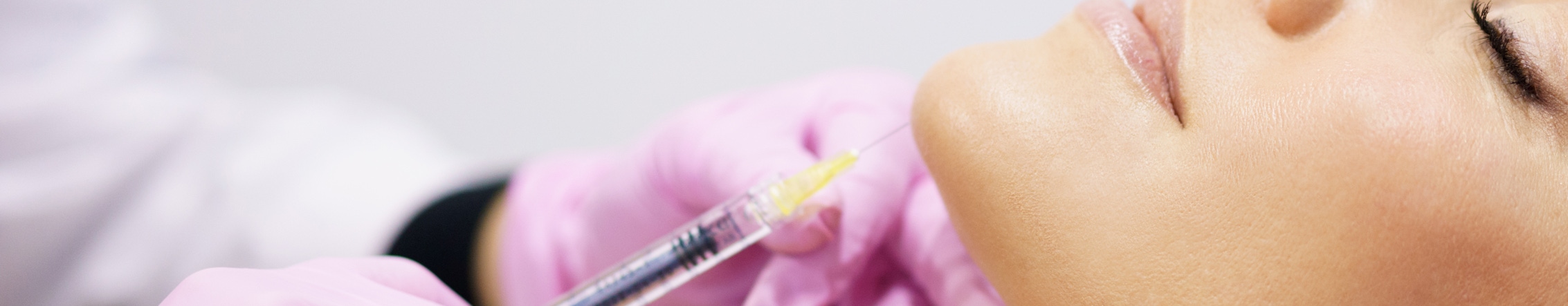 woman having chin enhancement treatment