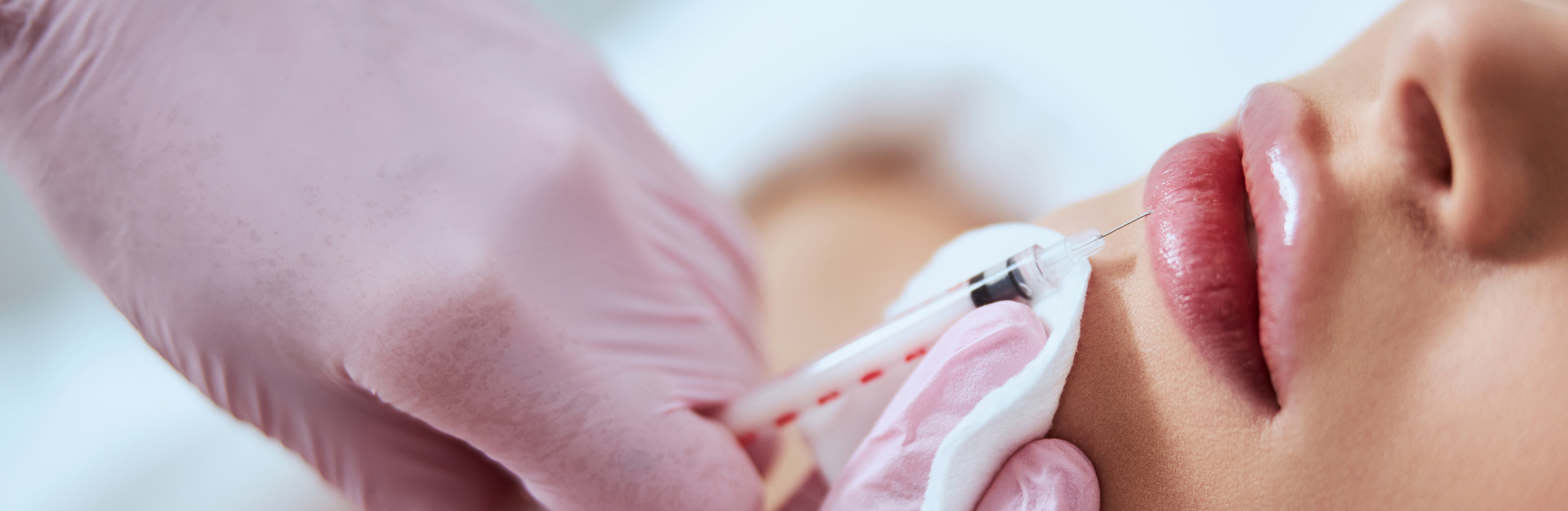 lip enhancement treatment being performed