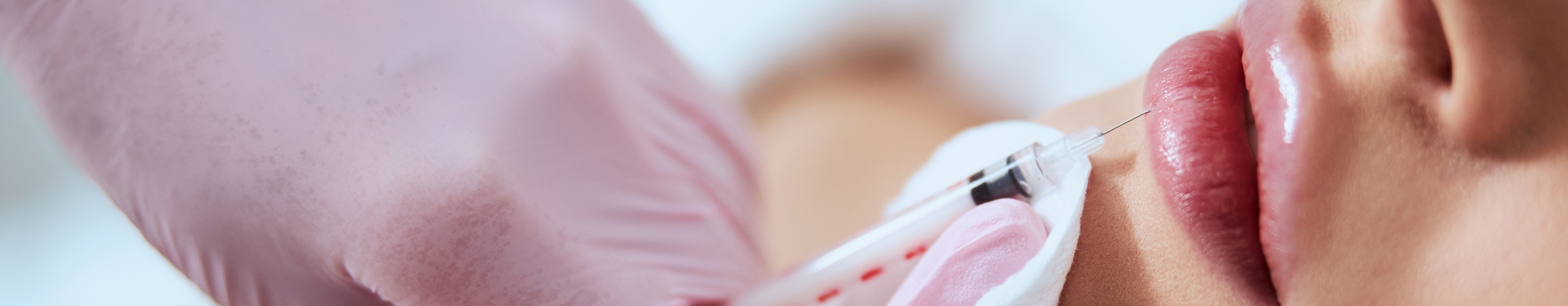 lip enhancement treatment being performed