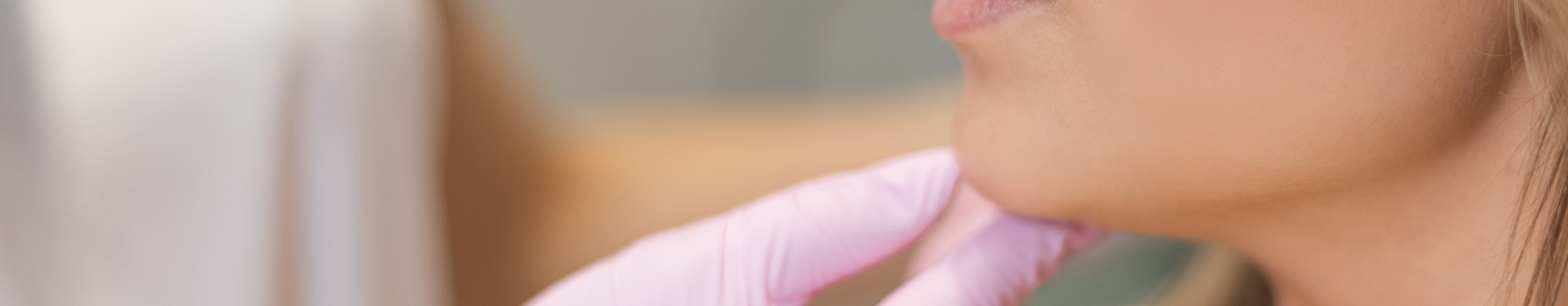 woman having jaw filler dissolving consultation