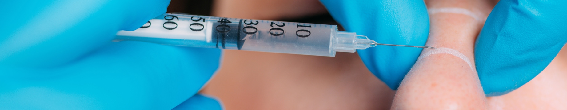 non surgical rhinoplasty being performed