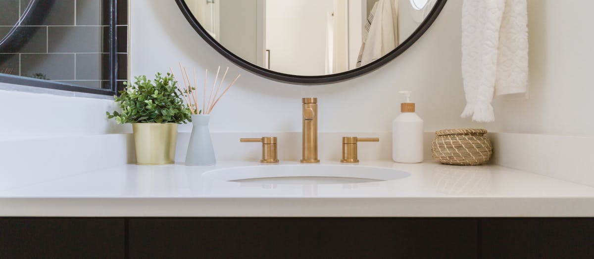 Bathroom vanity with round mirror 