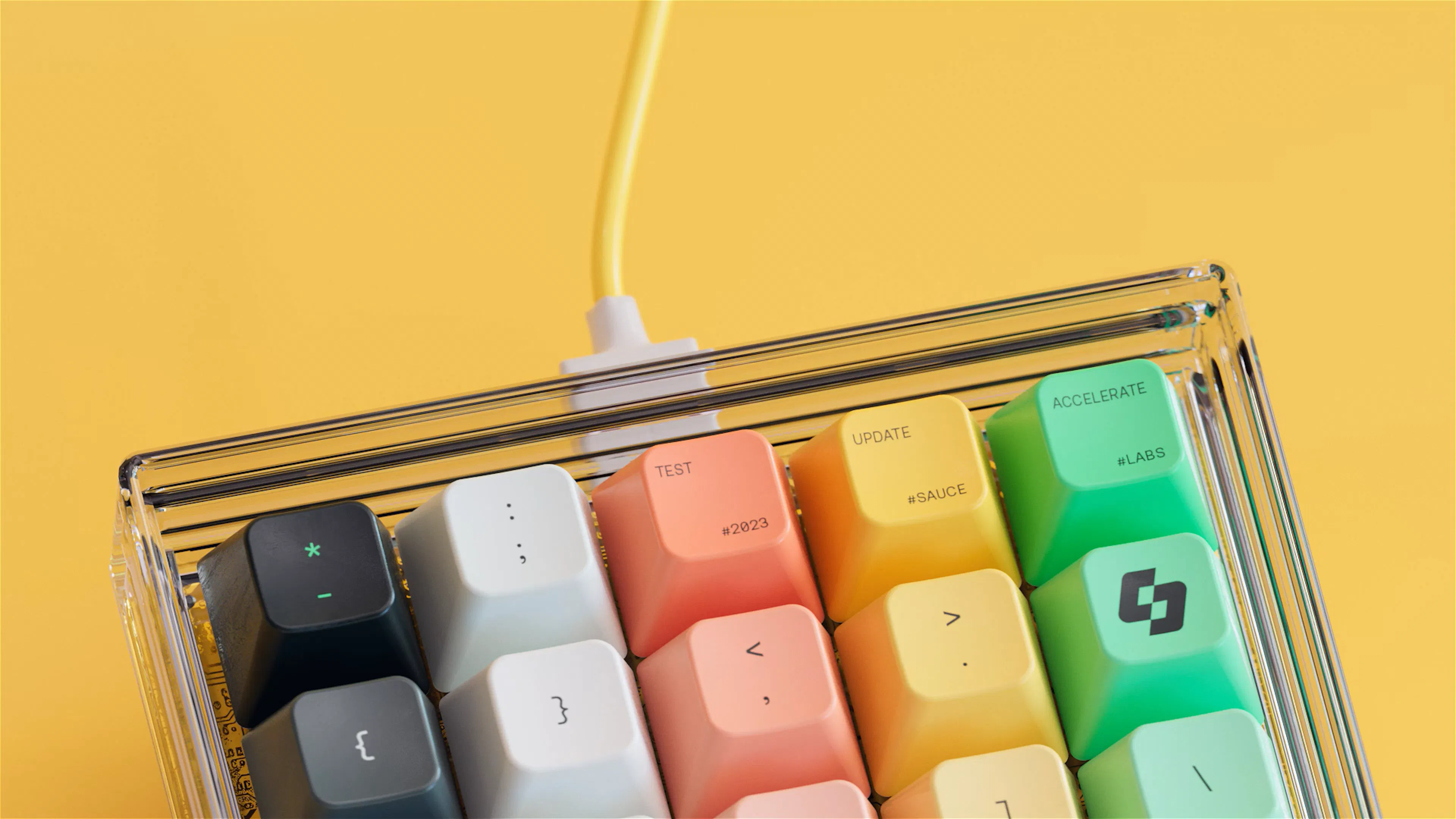 Close-up of a macro keypad with black, green, white, yellow and coral keycaps on a yellow background