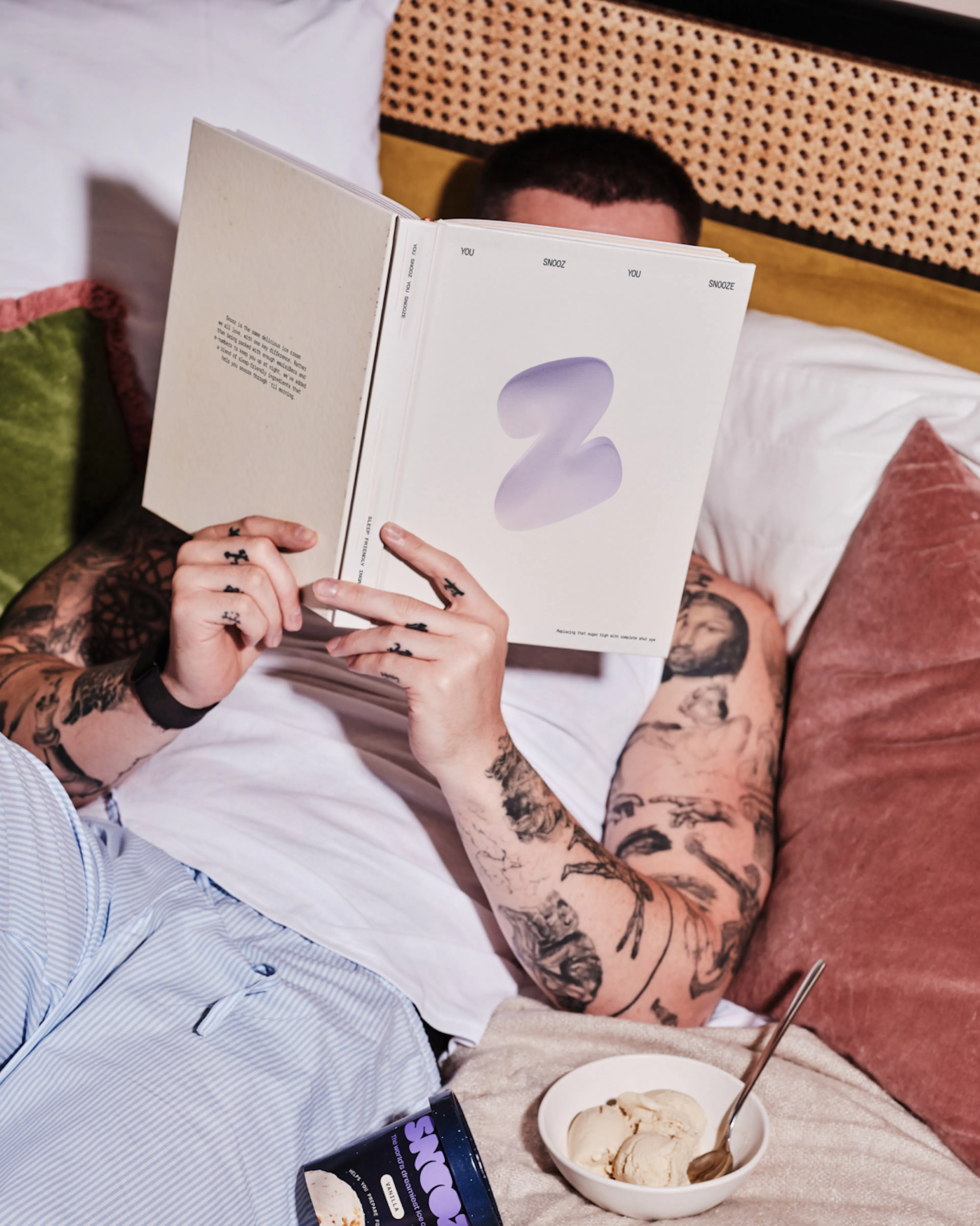 Image of man reading book on Snooz by HOW+HOW