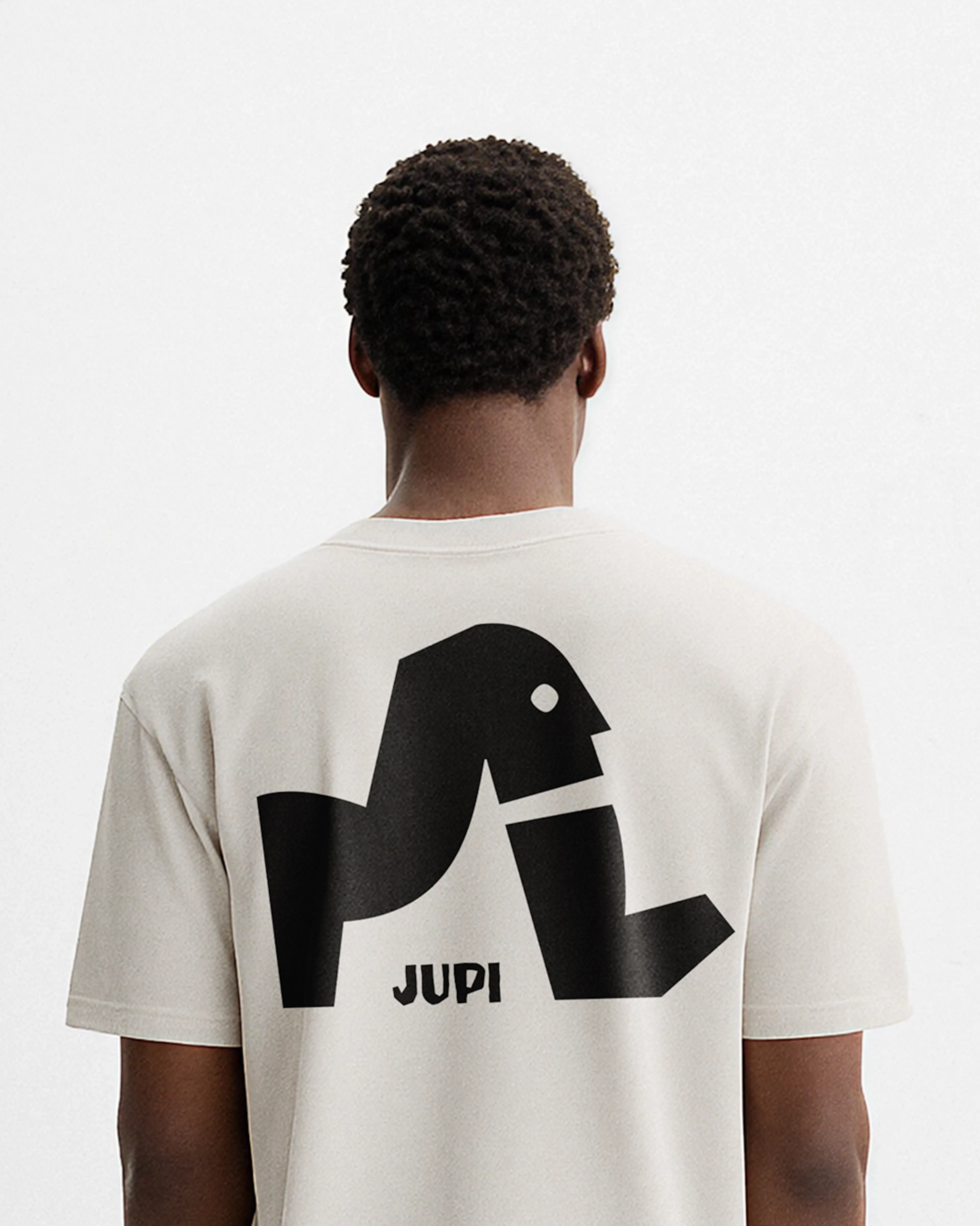 Man wearing a Jupi T-shirt with the figure logo on the back