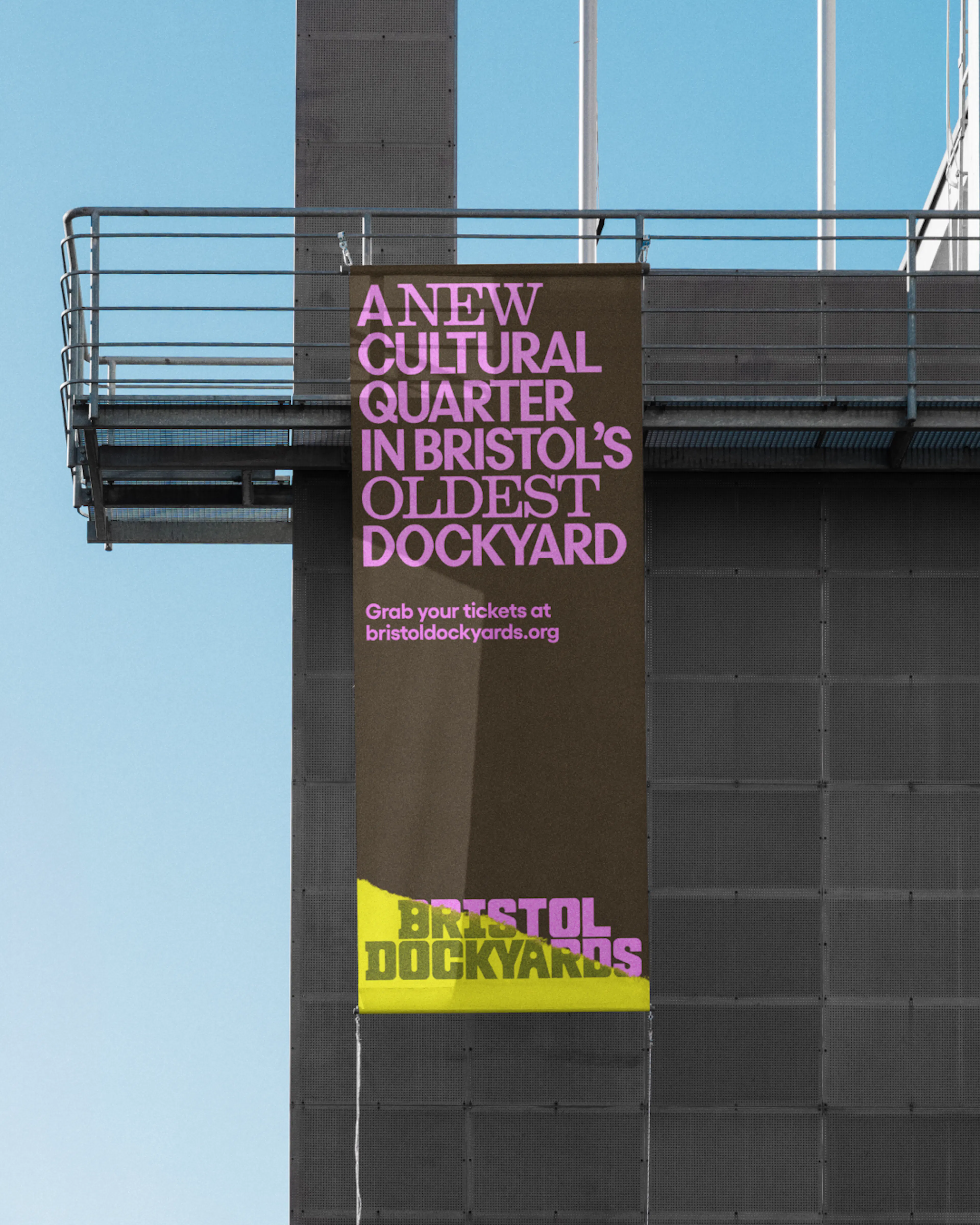 Bristol Dockyards poster on the side of a building