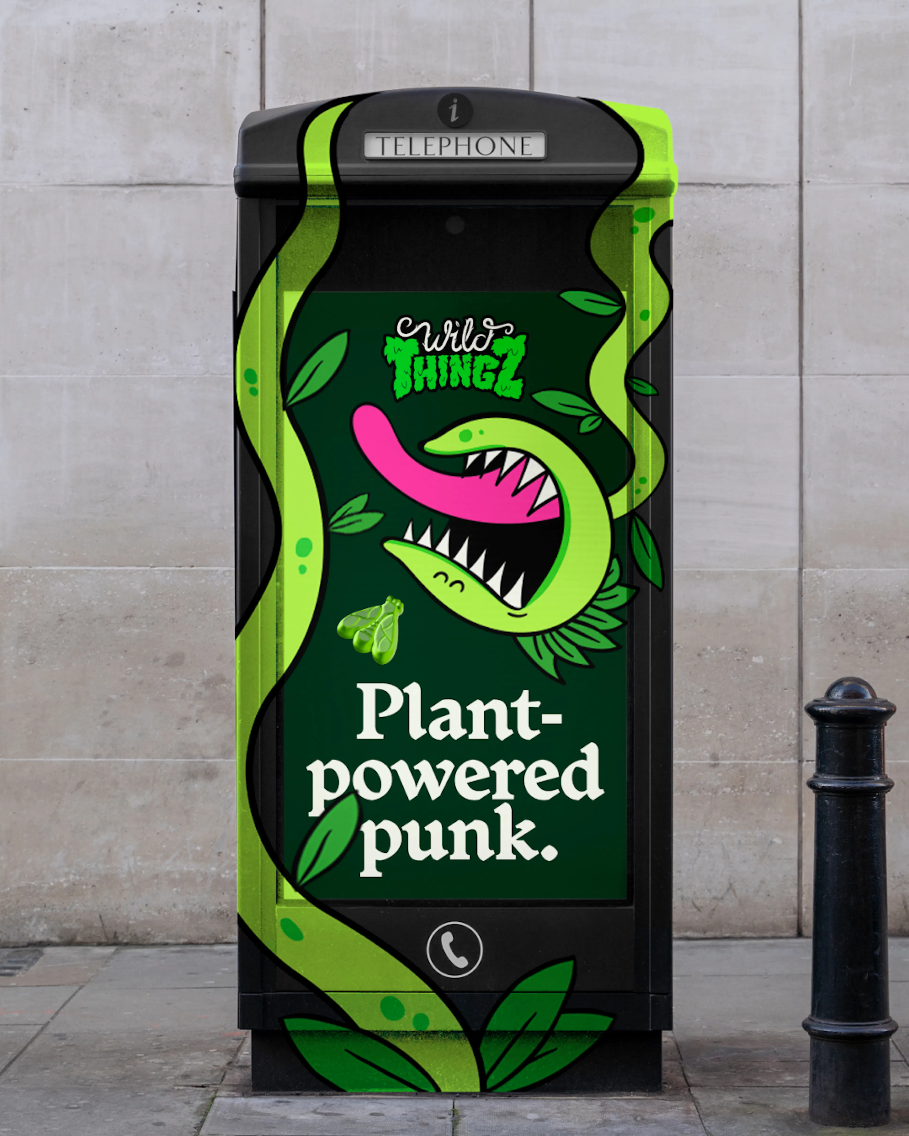 Phone box wrapped in Wild Thingz artwork reading 'Plant-powered punk.' with Vee the Venus flytrap