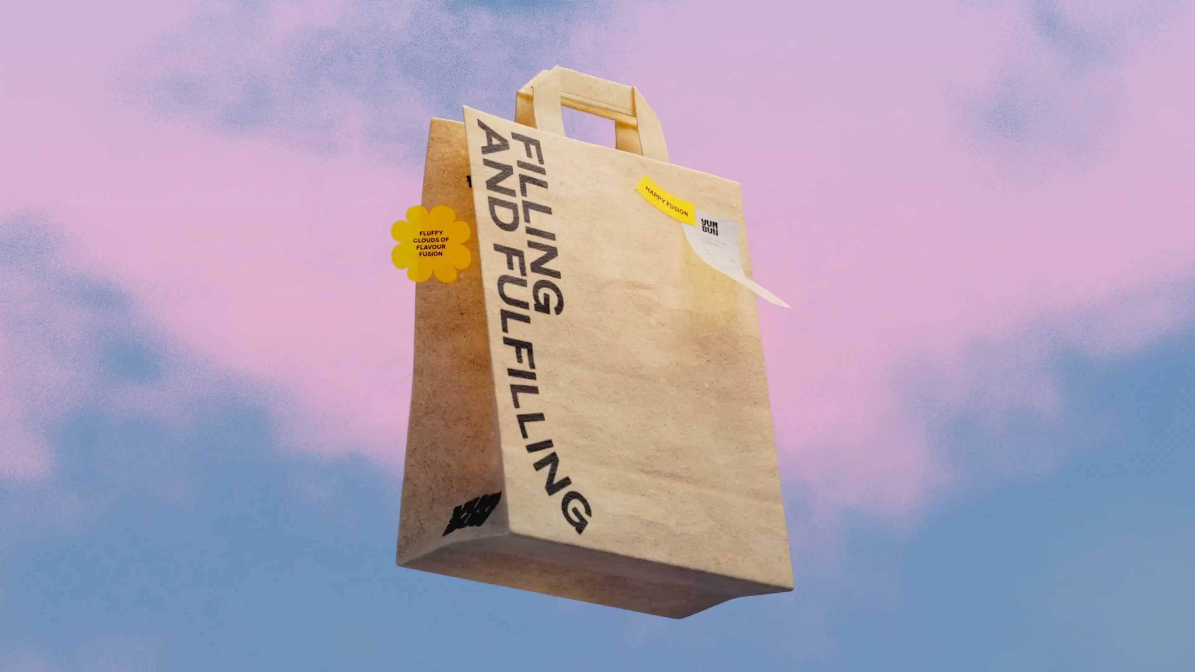 Yum Bun kraft paper takeaway bag with a receipt and sticker, set against a pink and blue sky