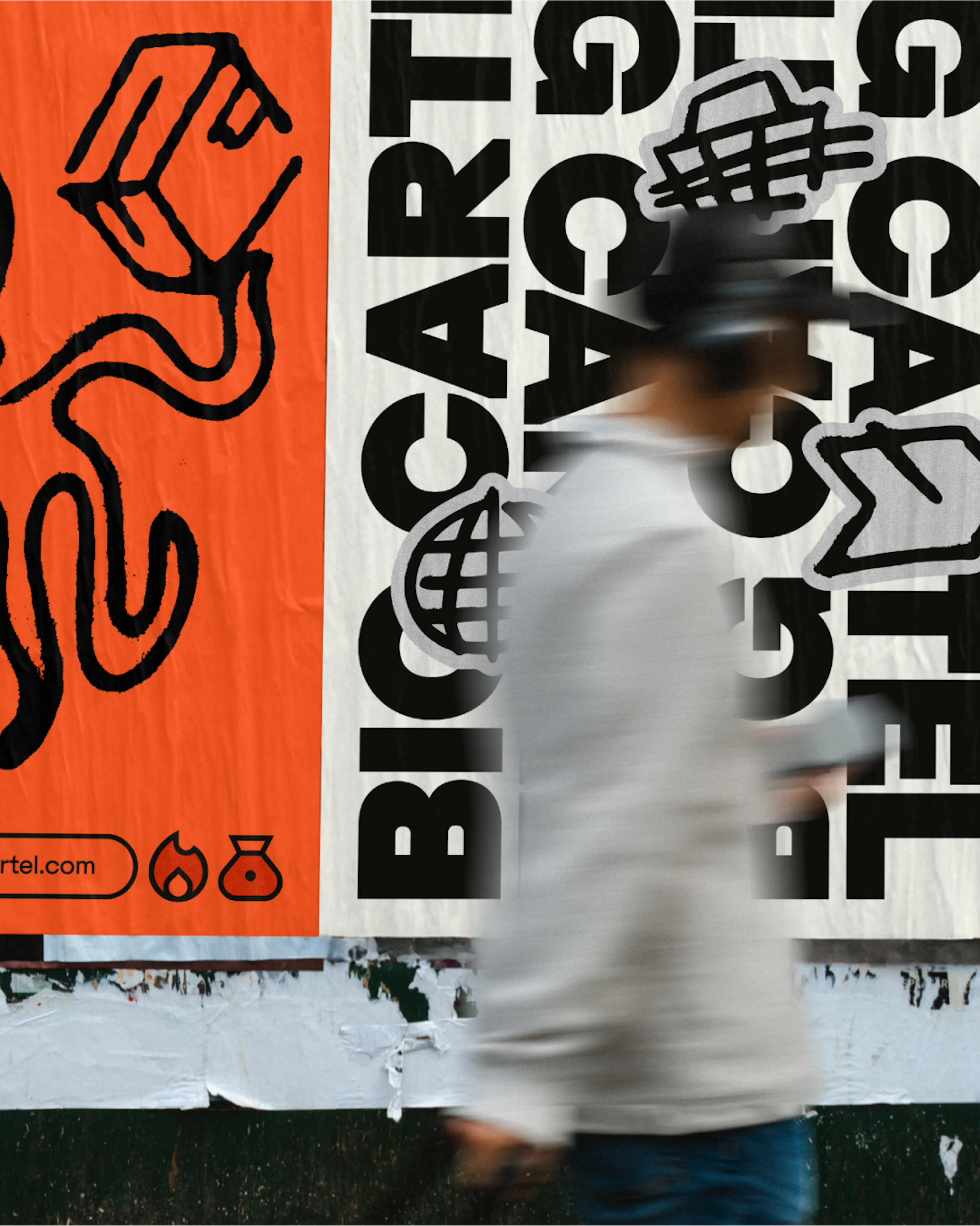Person walking past Big Cartel street posters, including an orange octopus illustration