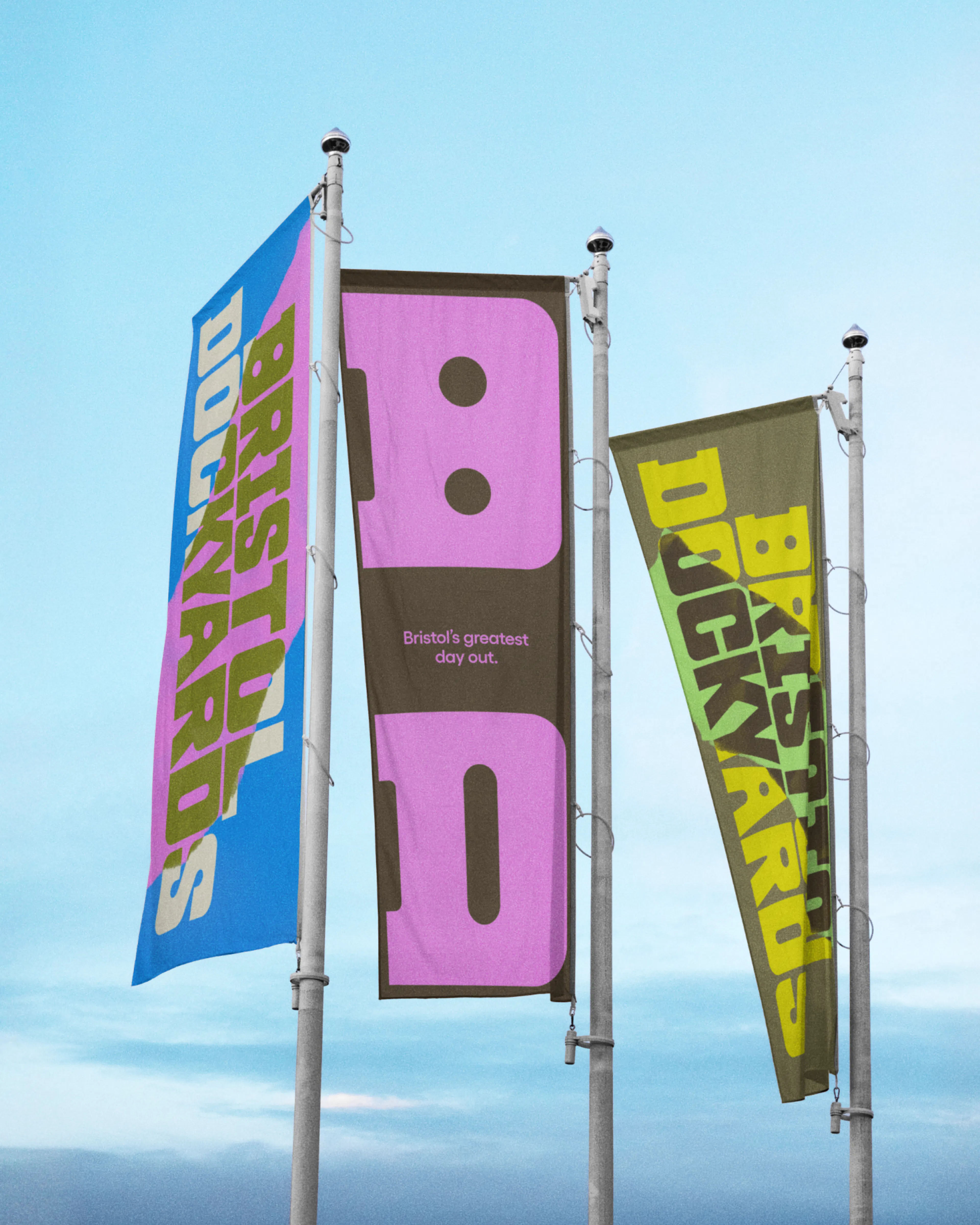 Three Bristol Dockyards flags flying at the site
