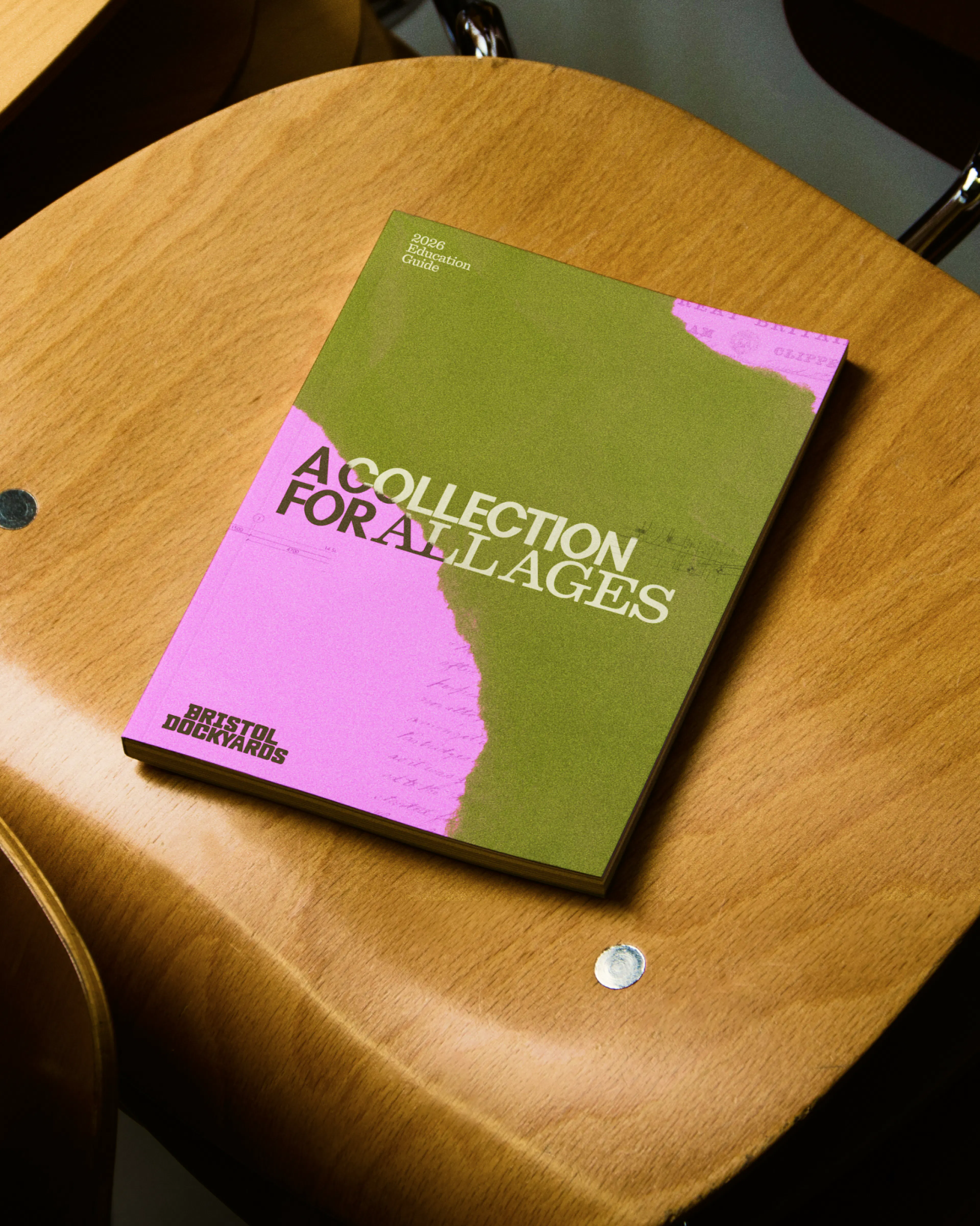 Image showing print brochure collage on a chair for Bristol Dockyards by HOW+HOW