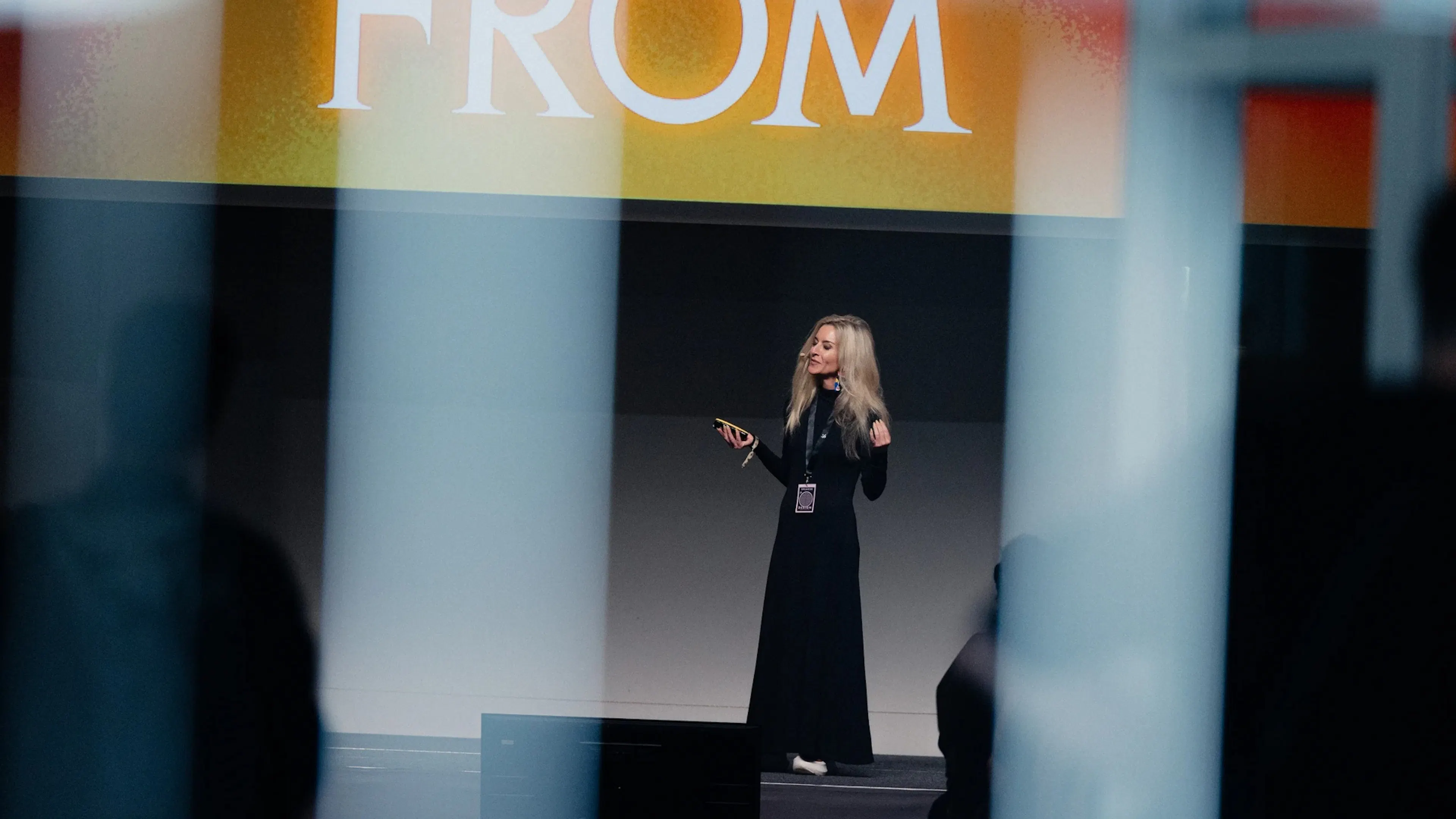 Cat How presenting "Conviction Is Free" to the audience at the ADC Conference