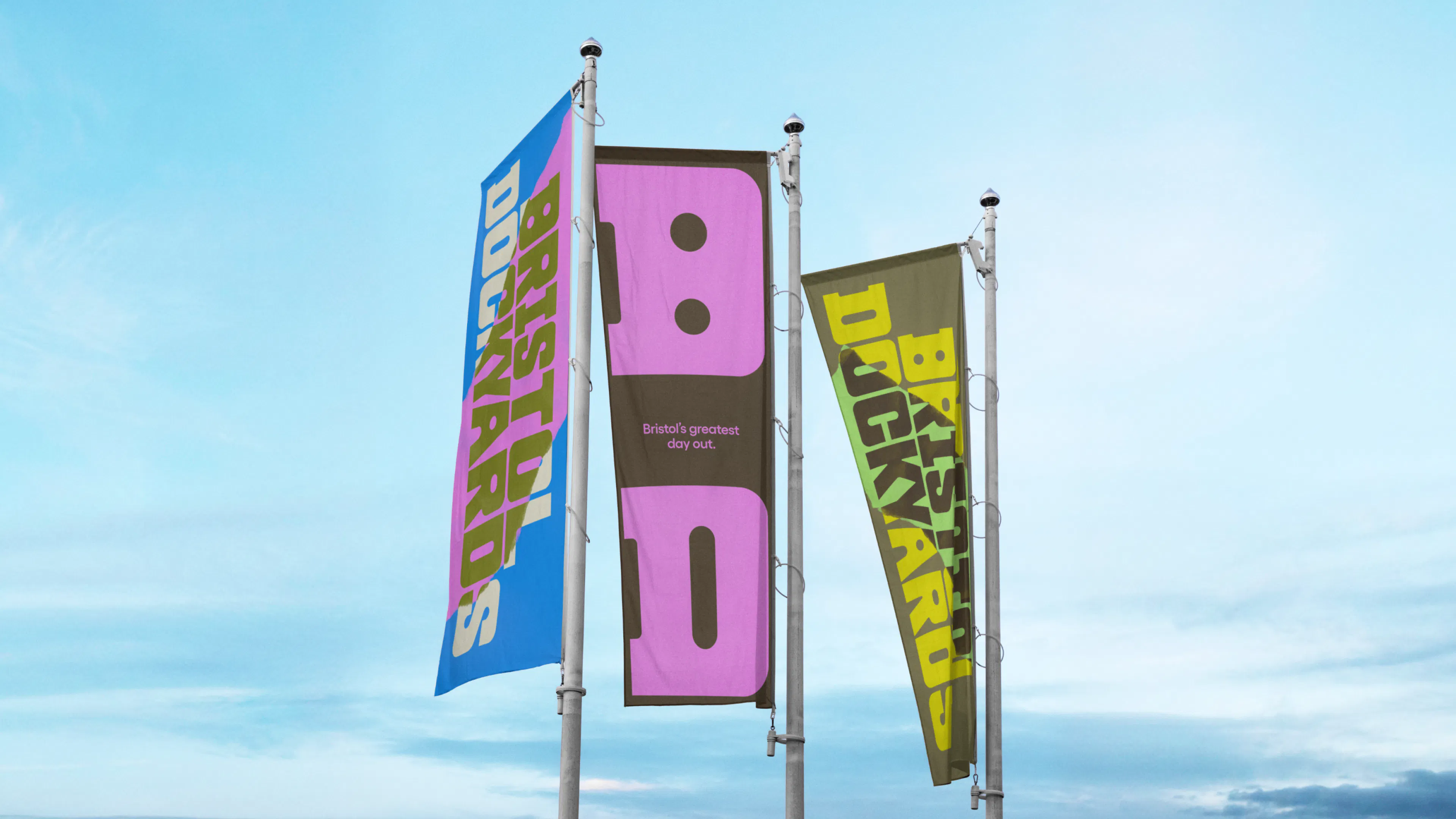 Three Bristol Dockyards flags flying at the site