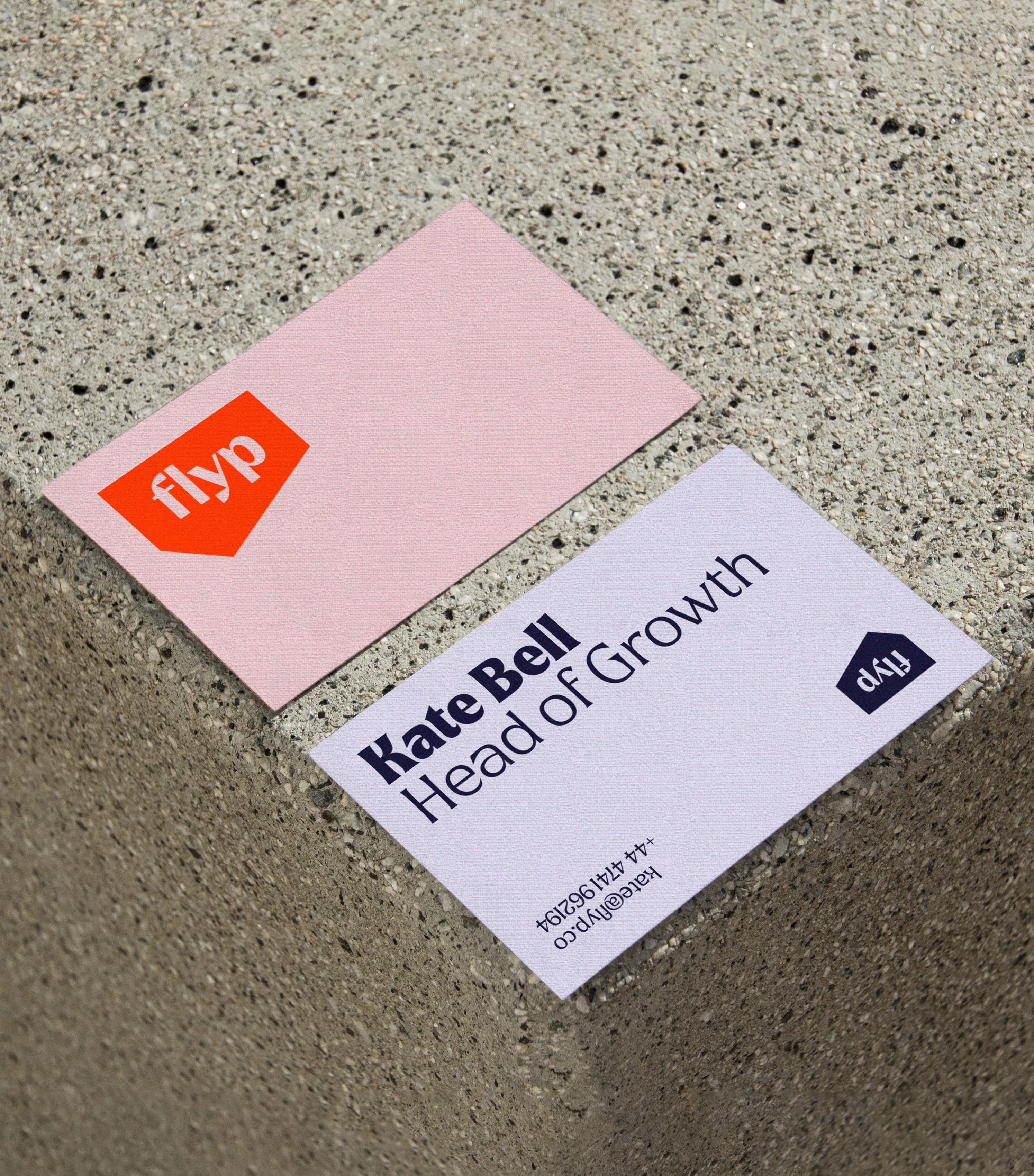 flyp business cards for a Head of Growth on a terrazzo surface