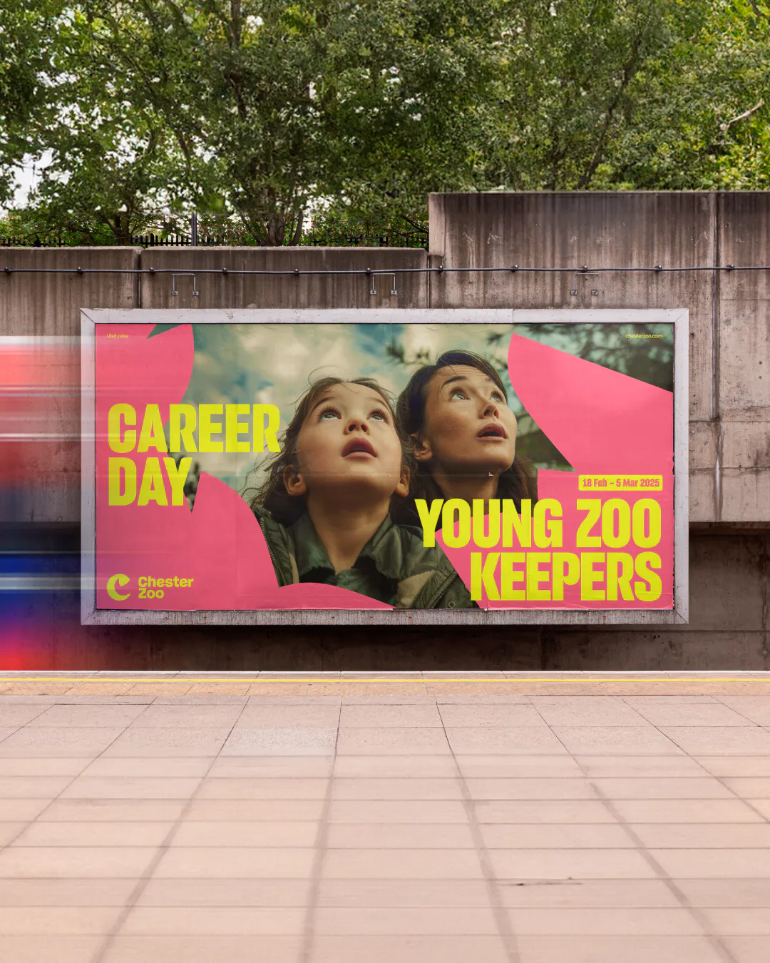 Chester Zoo 'Career Day: Young Zoo Keepers' billboard on a station platform