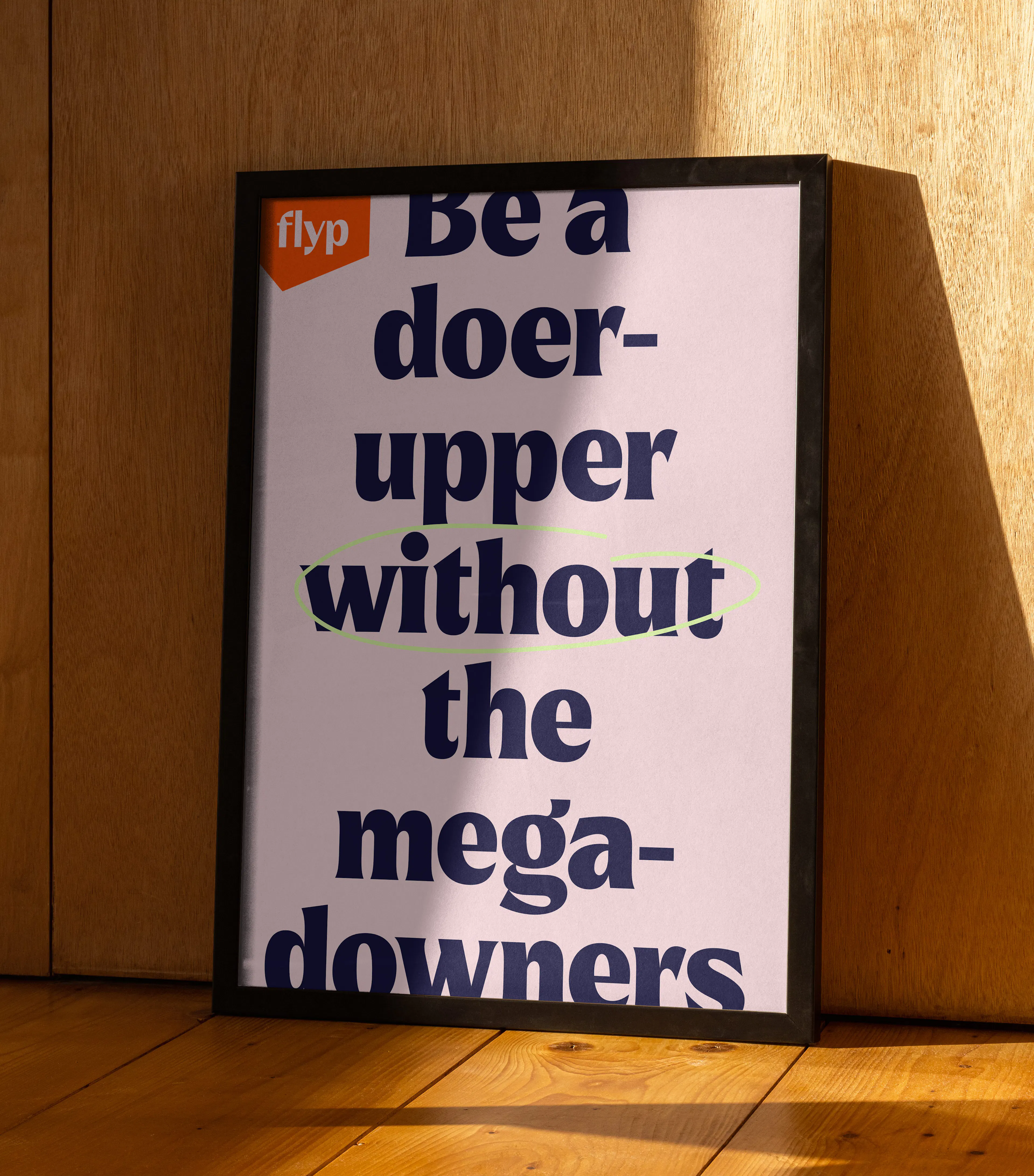 Framed flyp poster in warm light: 'Be a doer-upper without the mega-downers'