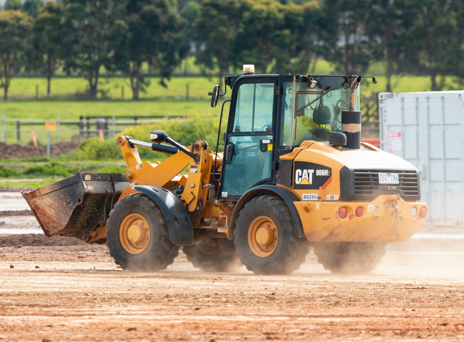 Digger at work at residential estate development. Photo by Troy Mortier on Unsplash