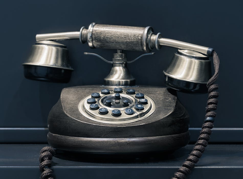 Old style telephone. Photo by Pawel Czerwinski on Unsplash