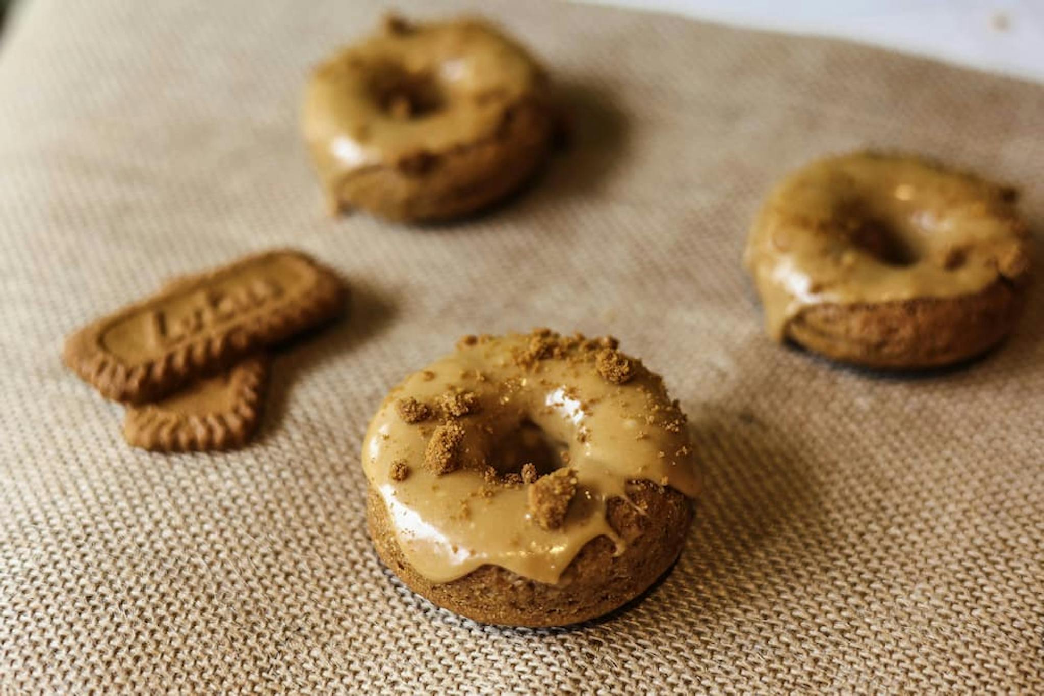 Bagels topped with savory cream and cookie pieces