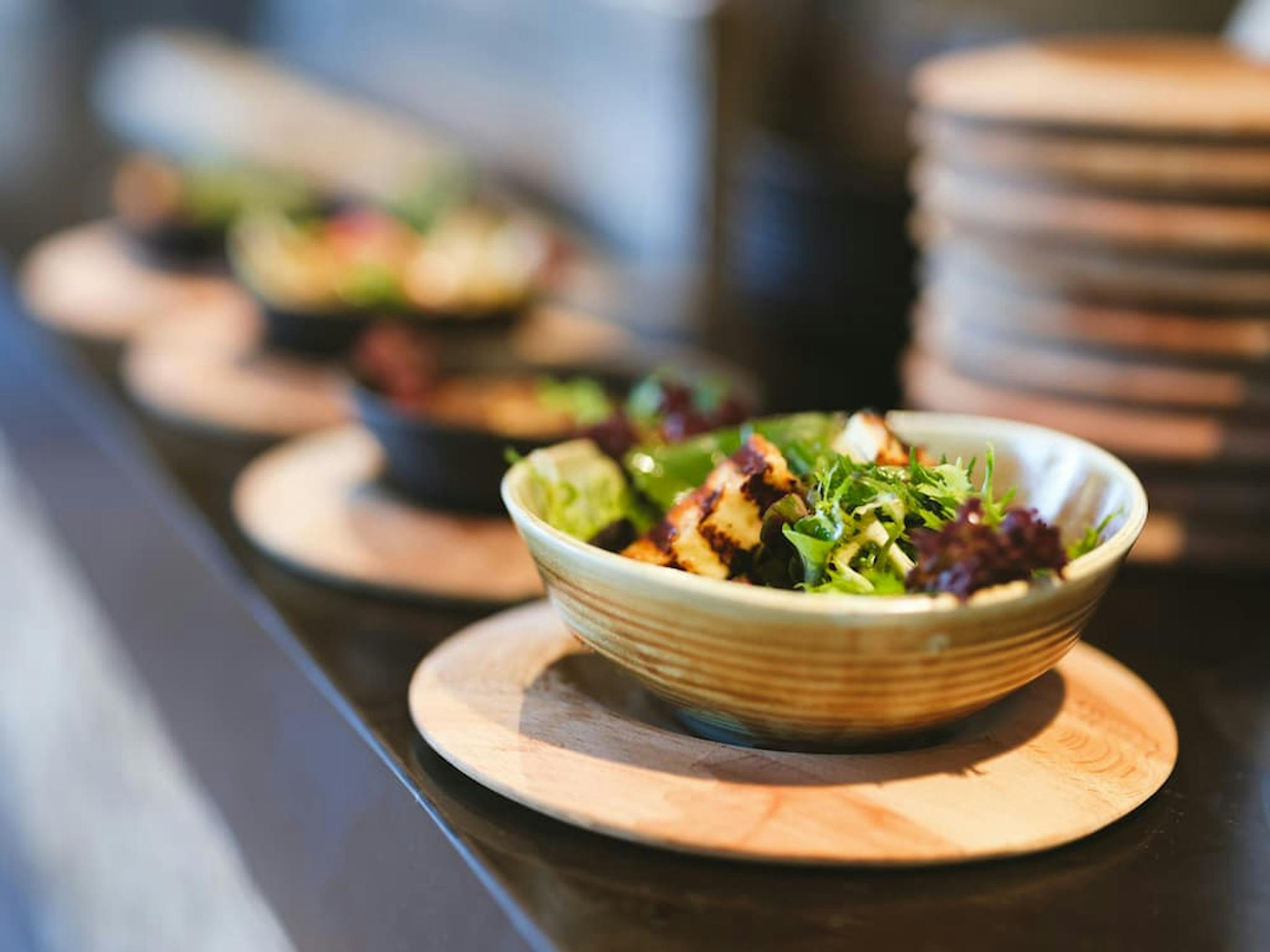 Plate with fresh salad served on an elegant table.