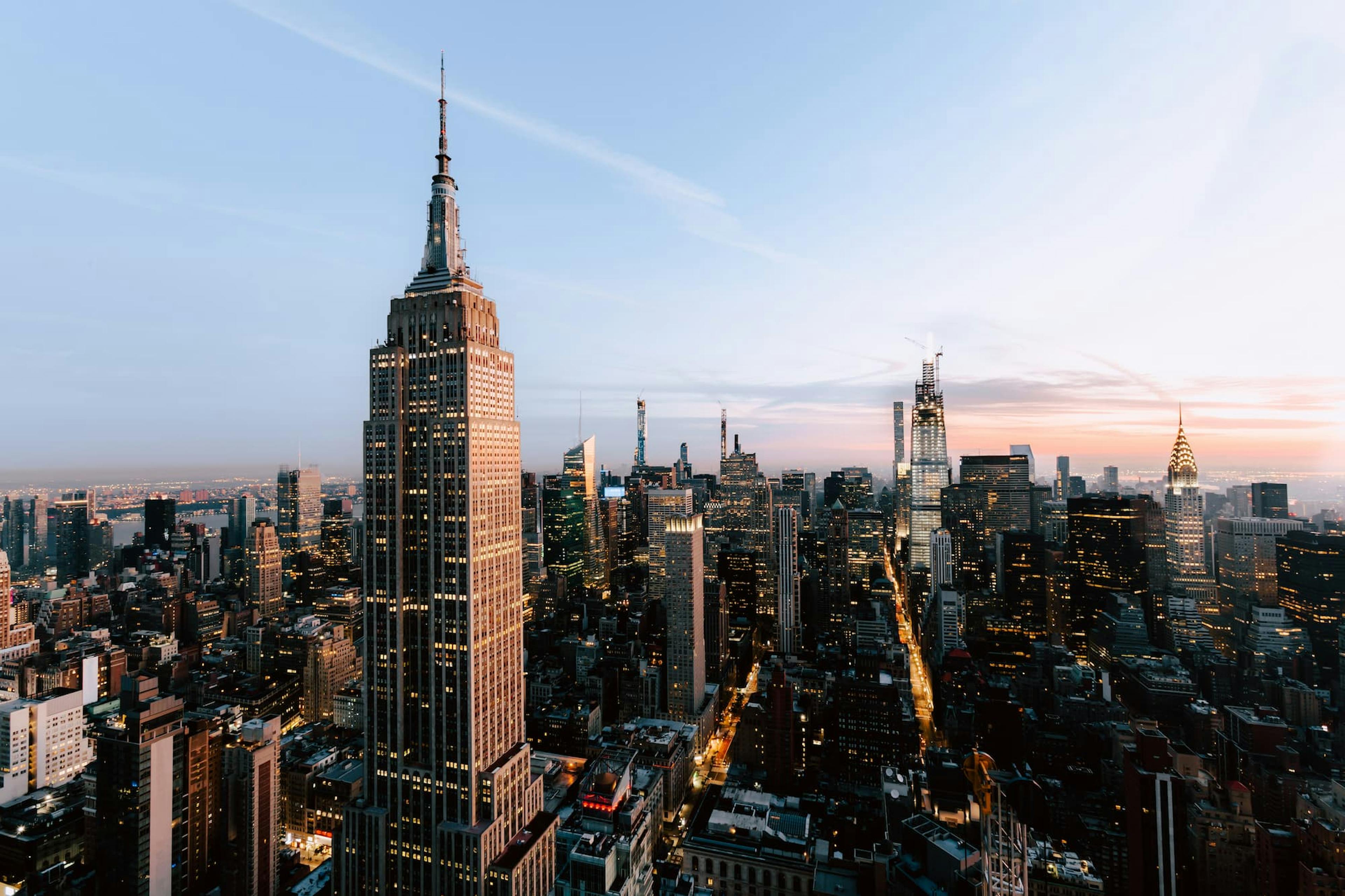 Stunning NYC skyline at dusk—explore the best delivery restaurants in NYC while enjoying this iconic view.
