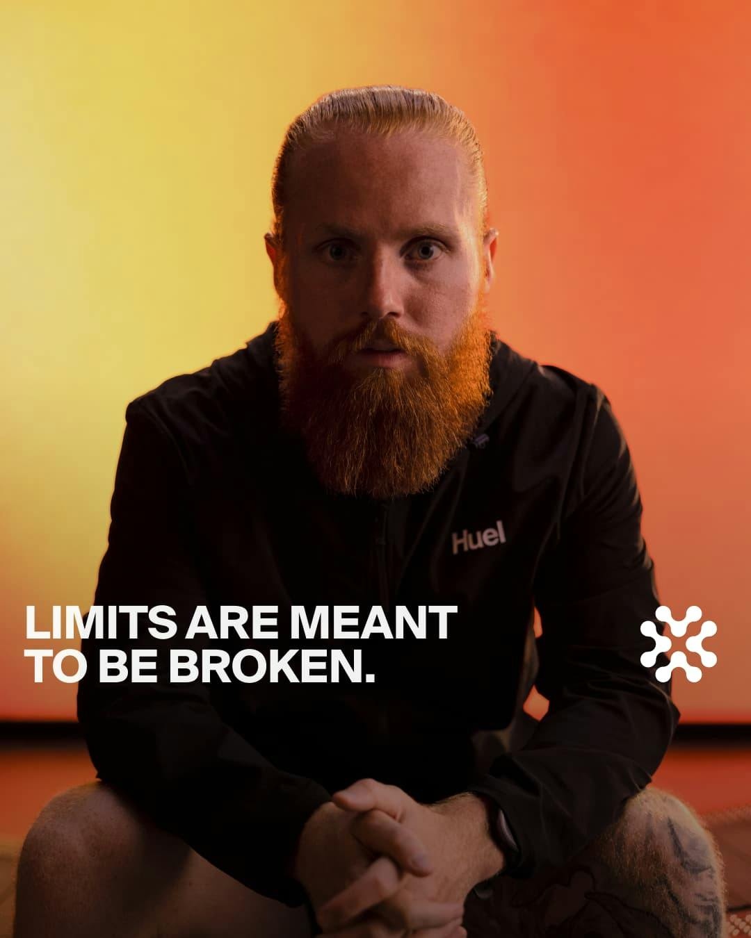 Russ Cook looking seriously into the camera, overlaid with the words, Limits are meant to be broken.