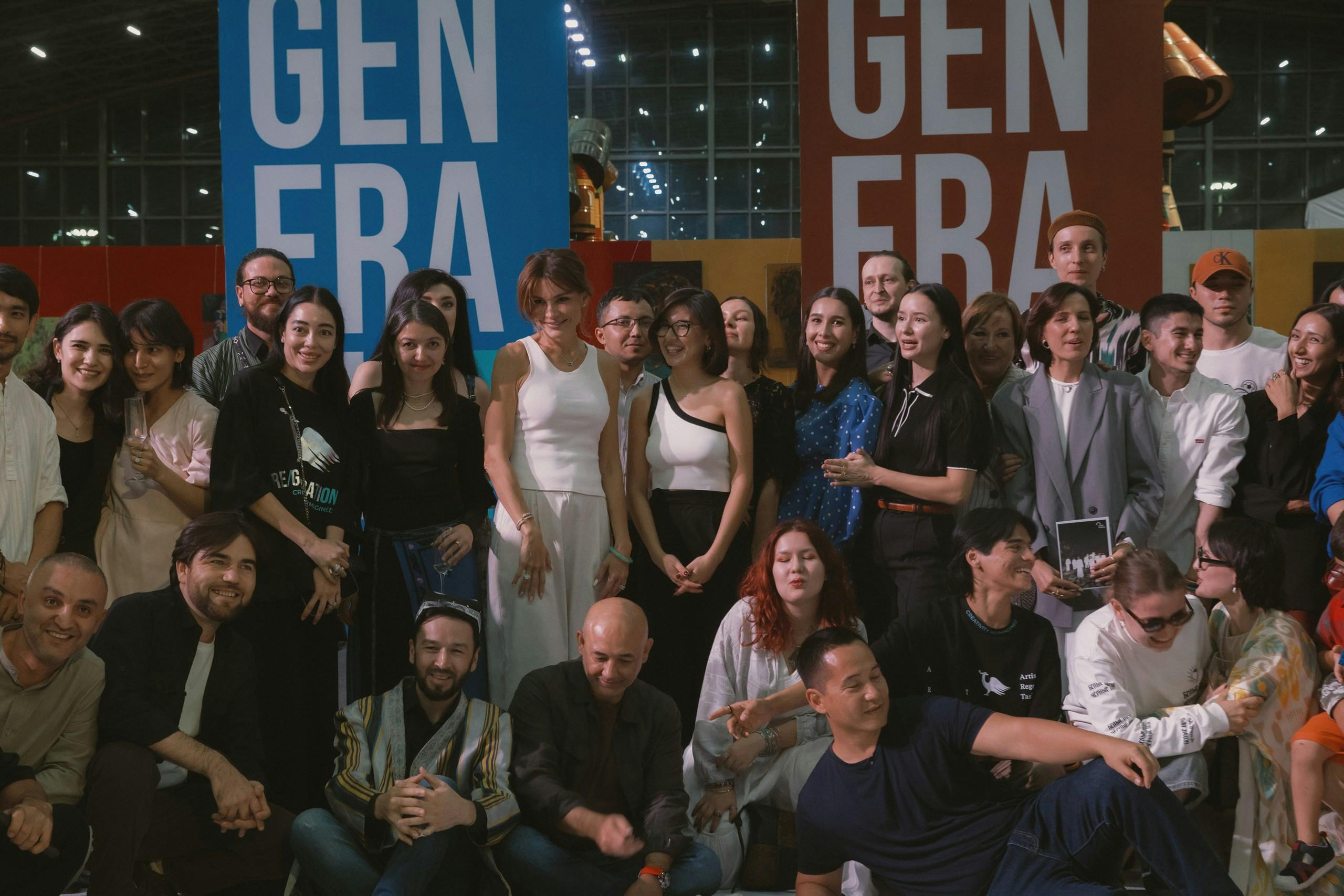 Lola et al posing in front of GEN FRA banners