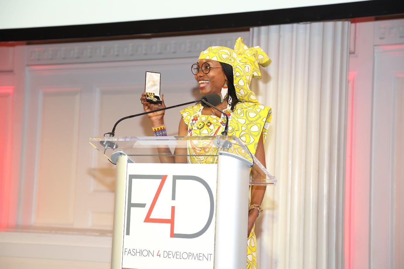 Hindou Oumarou Ibrahim at F4D podium in yellow