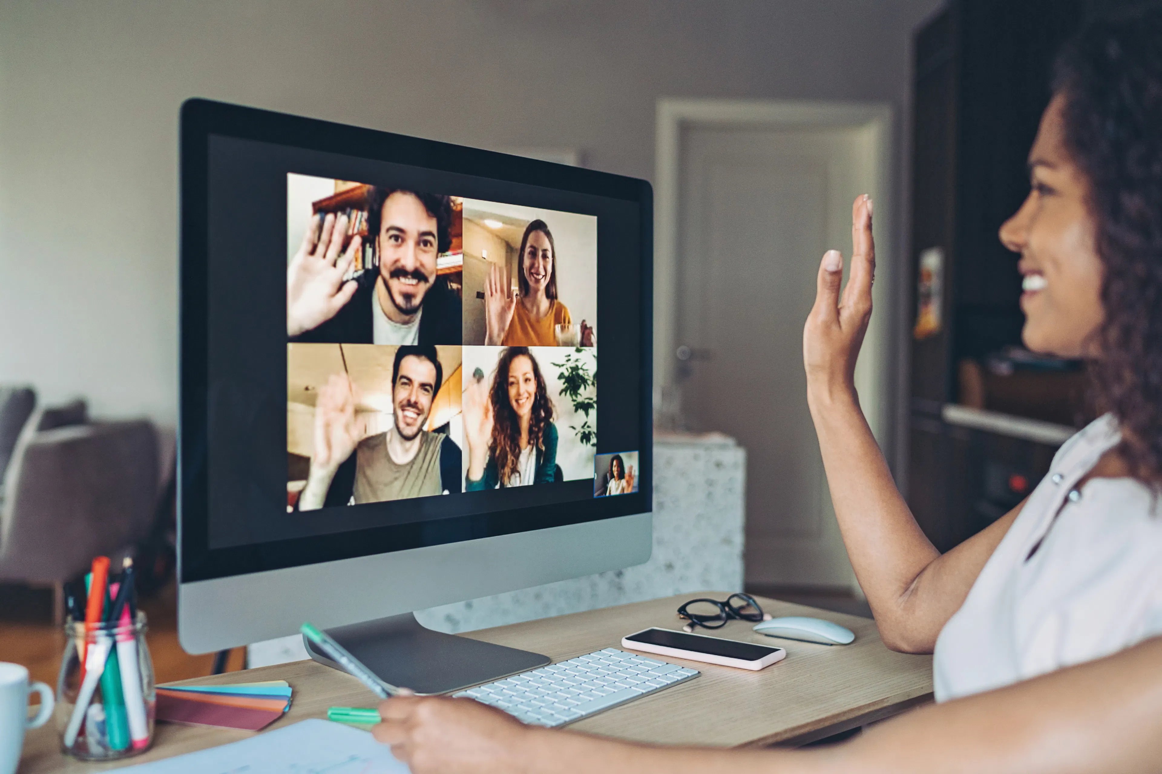 Woman smiling on an online meeting