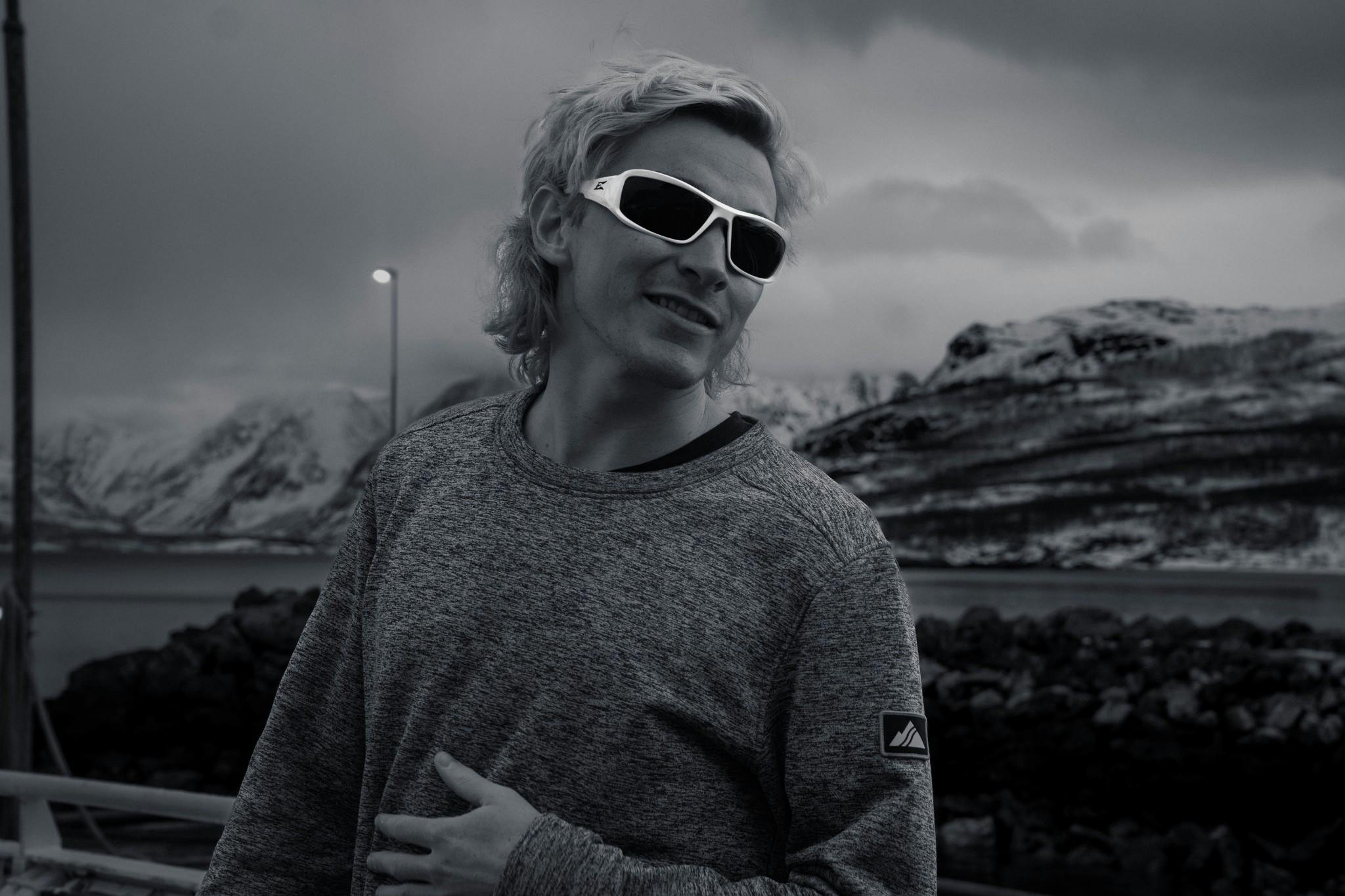 A black and white photo of a man with sunglasses