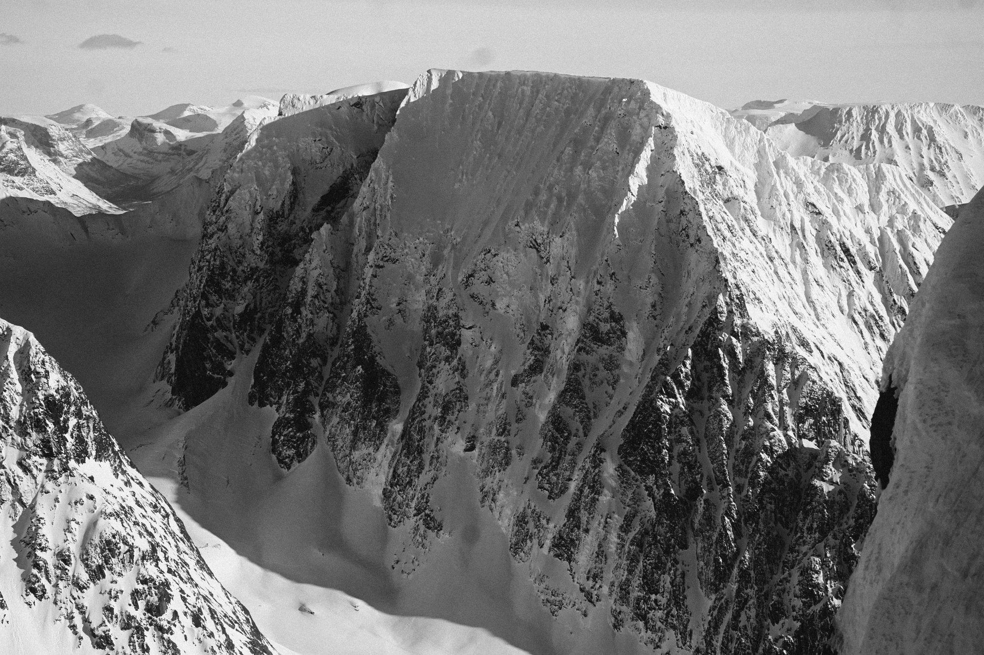 A black and white photo of a mountain