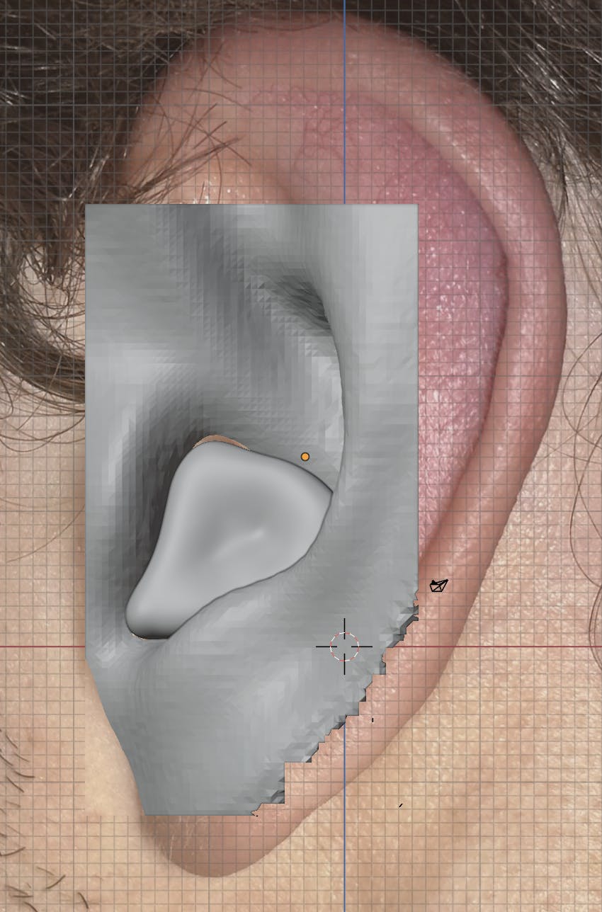 A LiDAR scan of an ear and a modelled earplug
