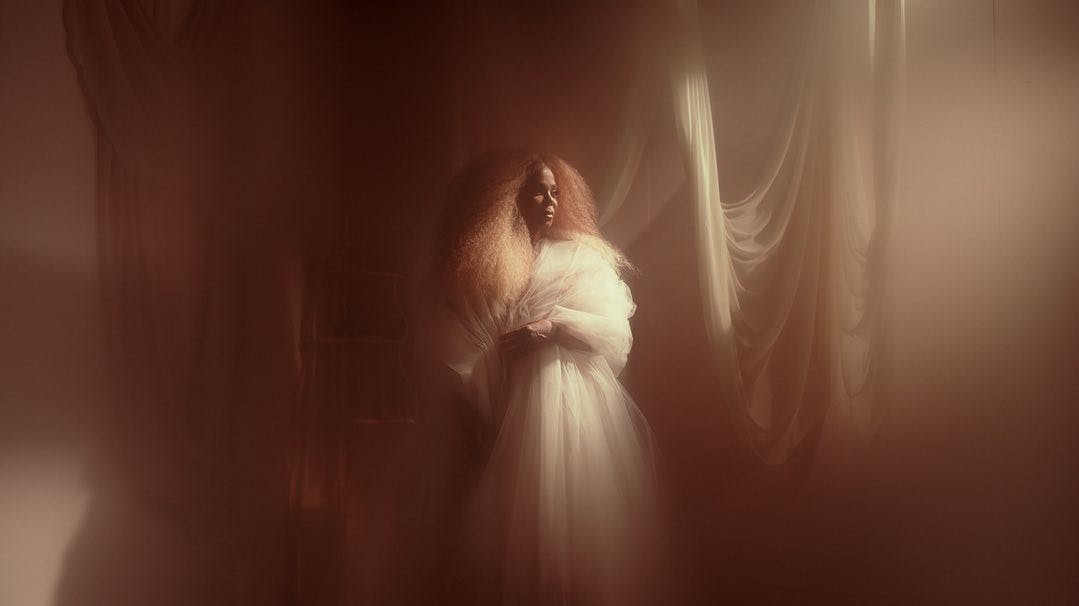Janet Jackson in a foggy room