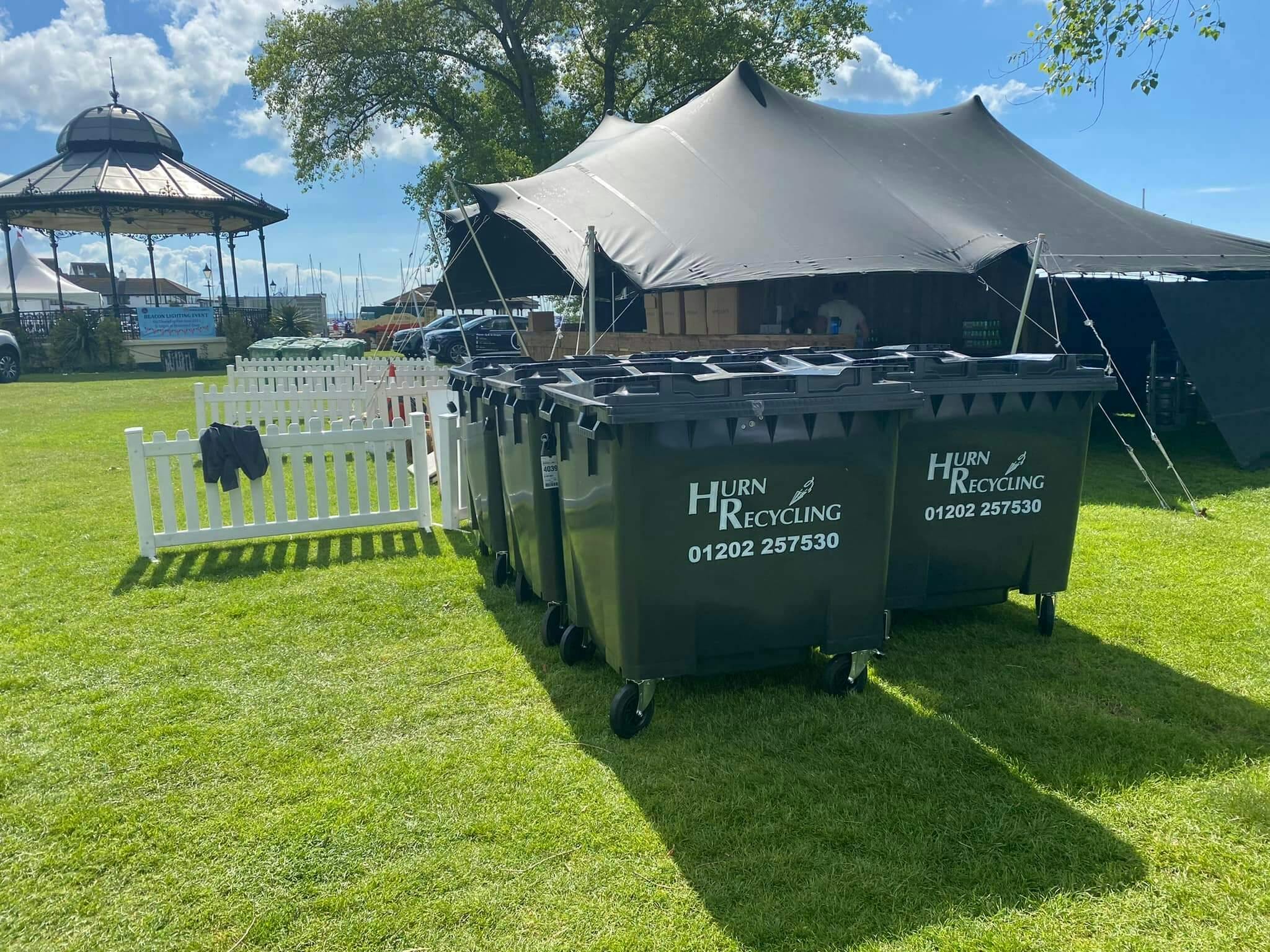 Waste bins outside tent