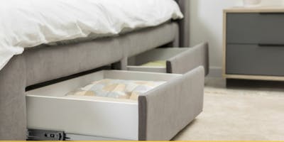 bed with open storage drawers