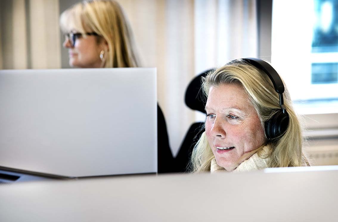 Woman working in front of a computer