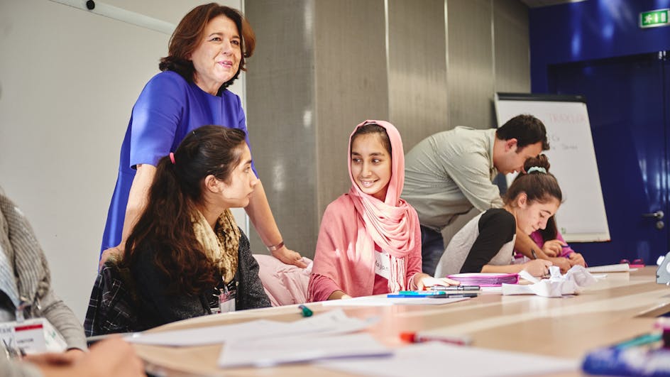 Woman with students